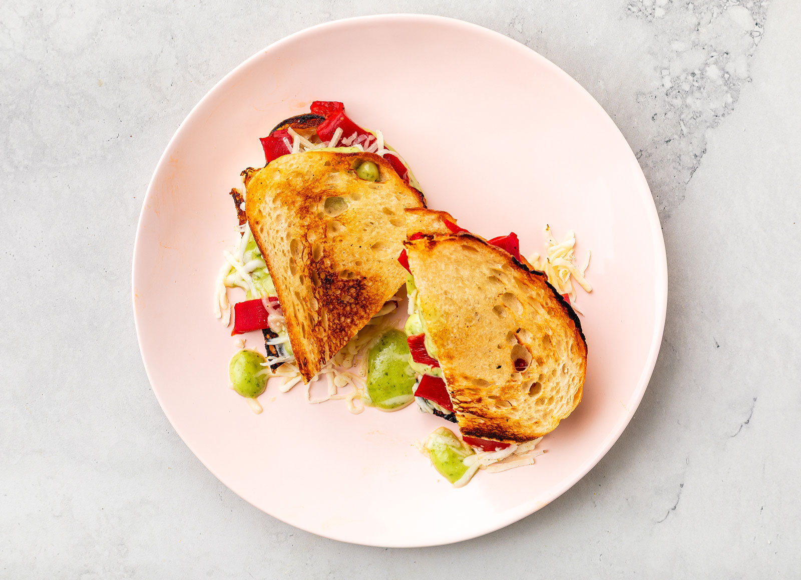 Creamy Pesto Roasted Pepper Grilled Cheese with Shredded Mozzarella Cheese