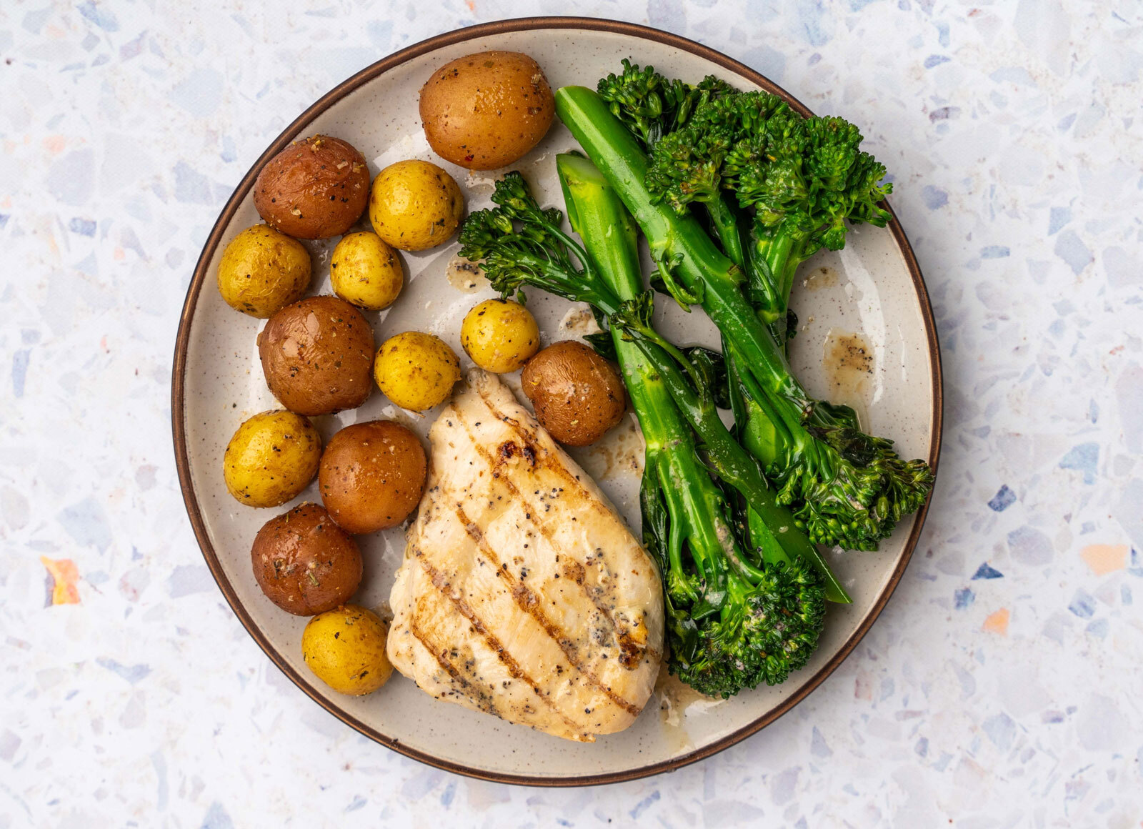 Caesar Seasoned Grilled Chicken Breast, Baby Broccoli + Herbed Multicolored Creamer Potatoes