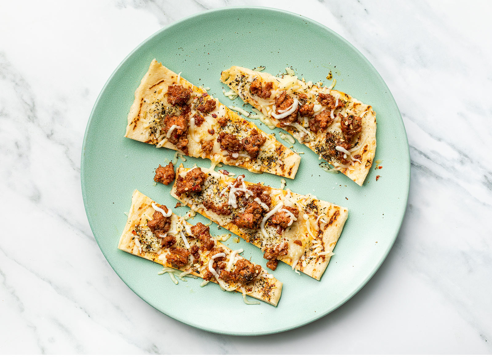 Herby Turkey Sausage White Pie with Shredded Mozzarella Cheese