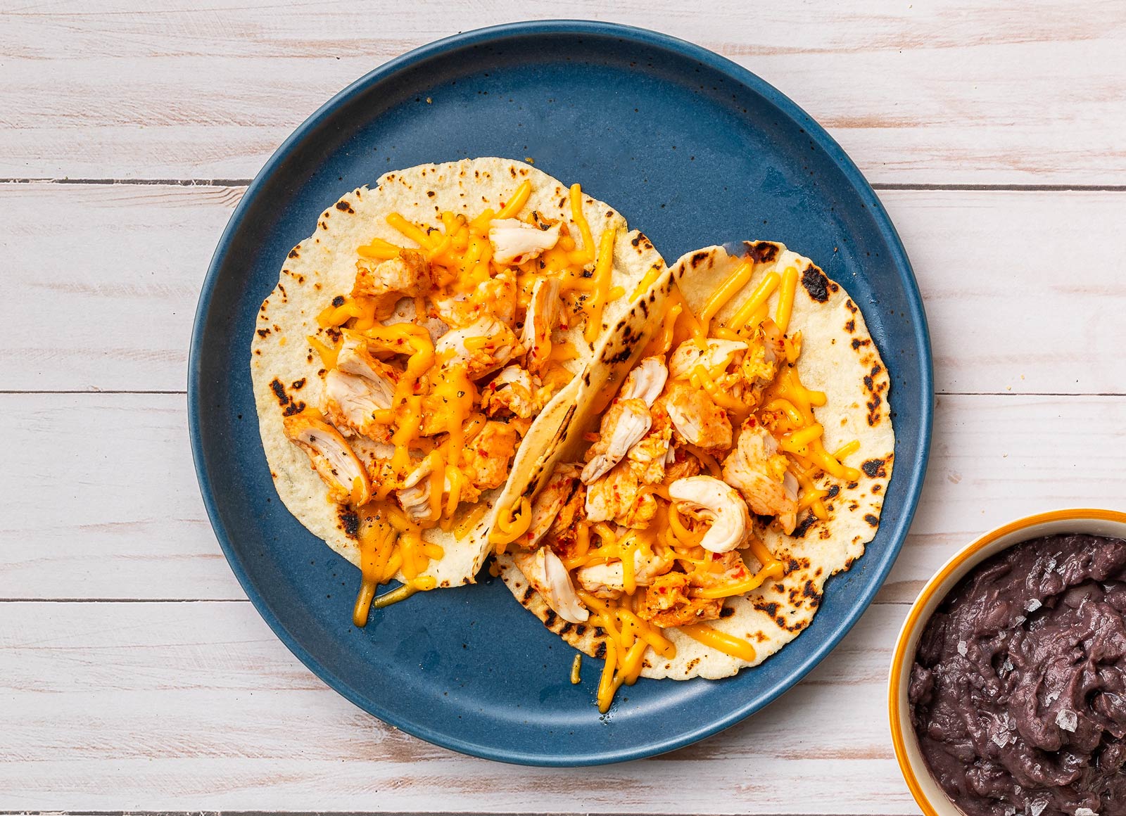 Cheesy Chile Limon Chicken Tacos + Cuban Spiced Black Beans