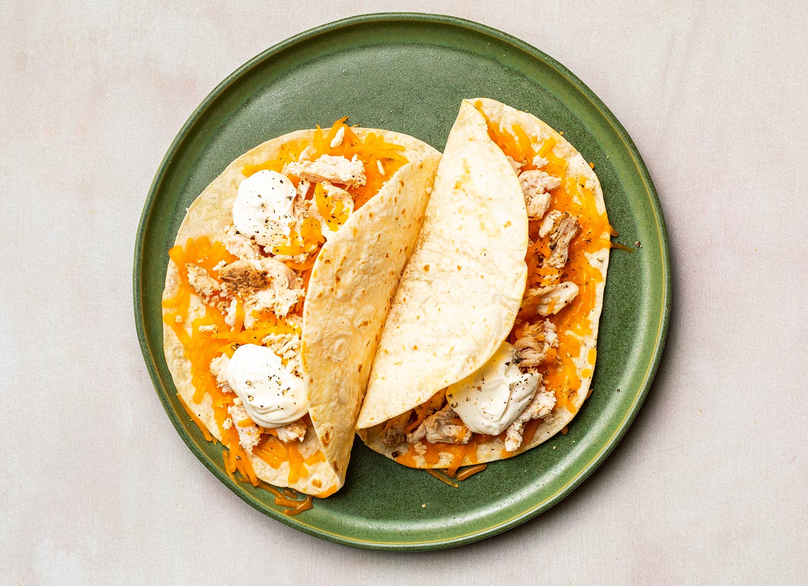 Pulled Chicken Taco with Sour Cultured Cream and Cheese