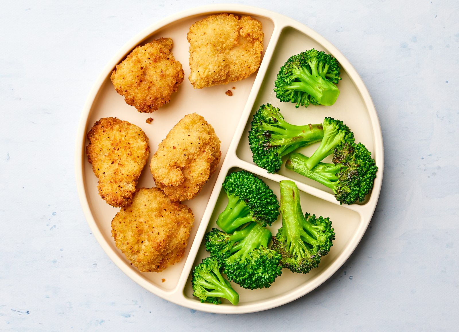 Chicken Nuggets + Steamed Broccoli Florets