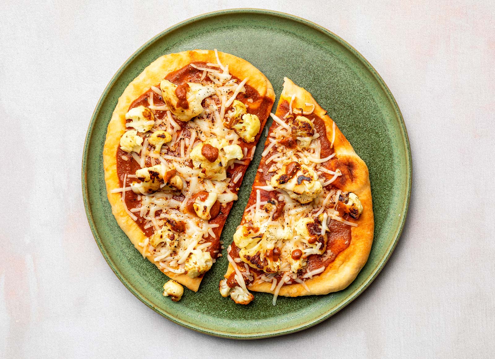 Cauliflower Tikka Masala Naan Pizza with Shredded Mozzarella Cheese