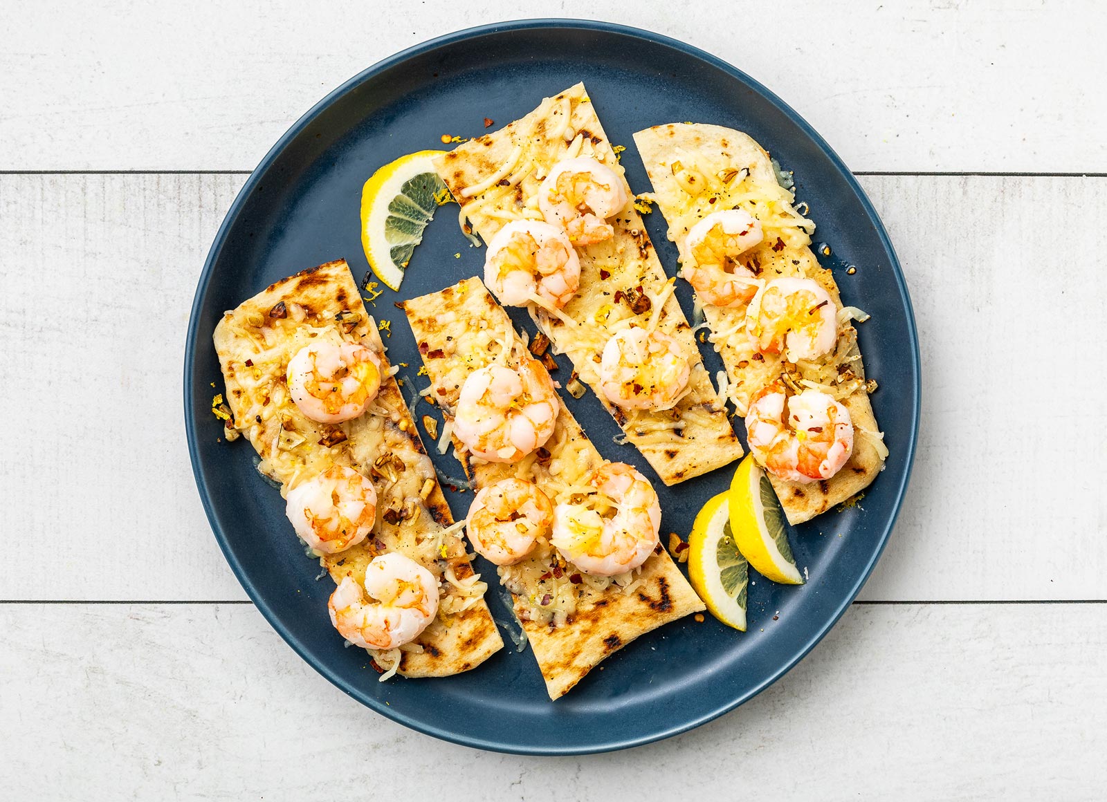 Shrimp Scampi Flatbread with Shredded Mozzarella Cheese