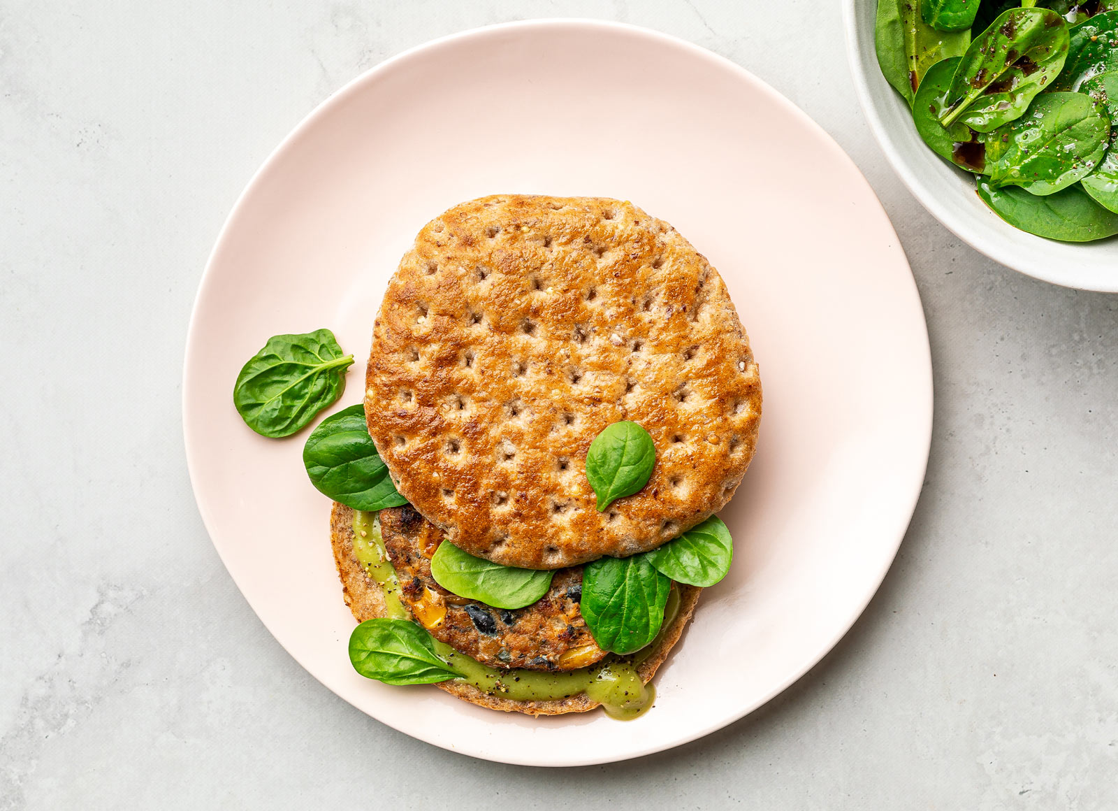 Creamy Avo Southwestern Chicken Burger with Baby Spinach