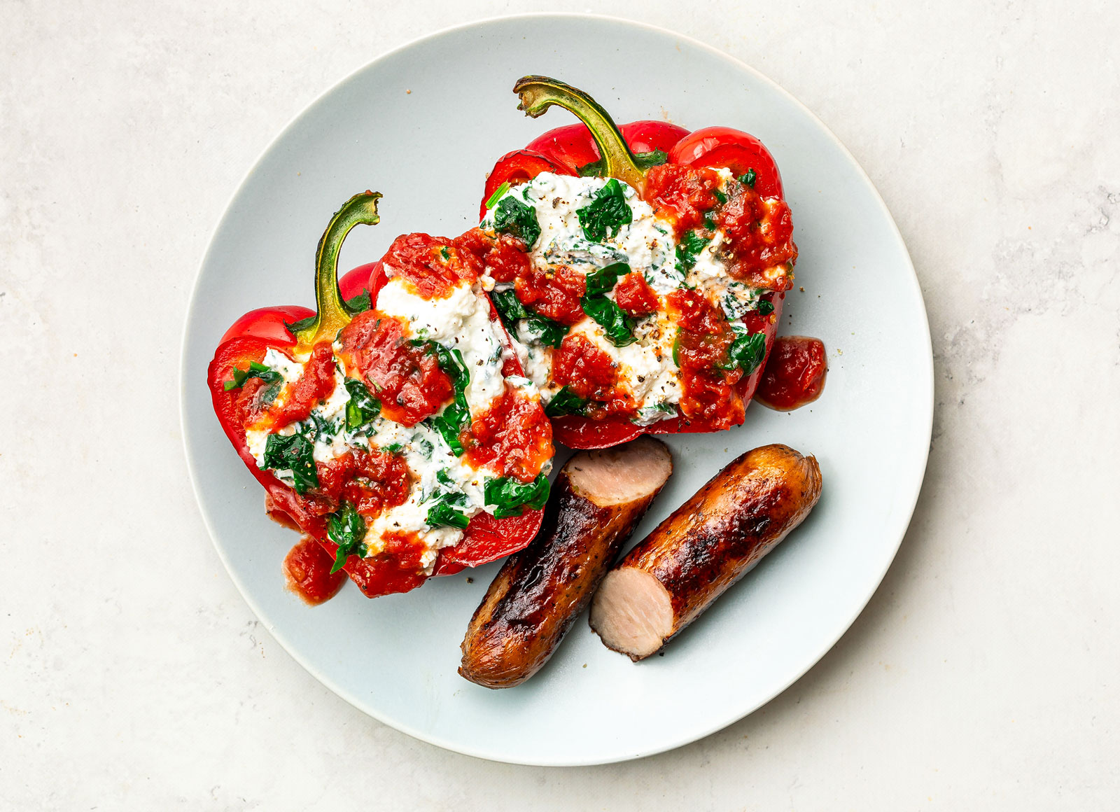 Italian Sausage Stuffed Peppers with Baby Spinach