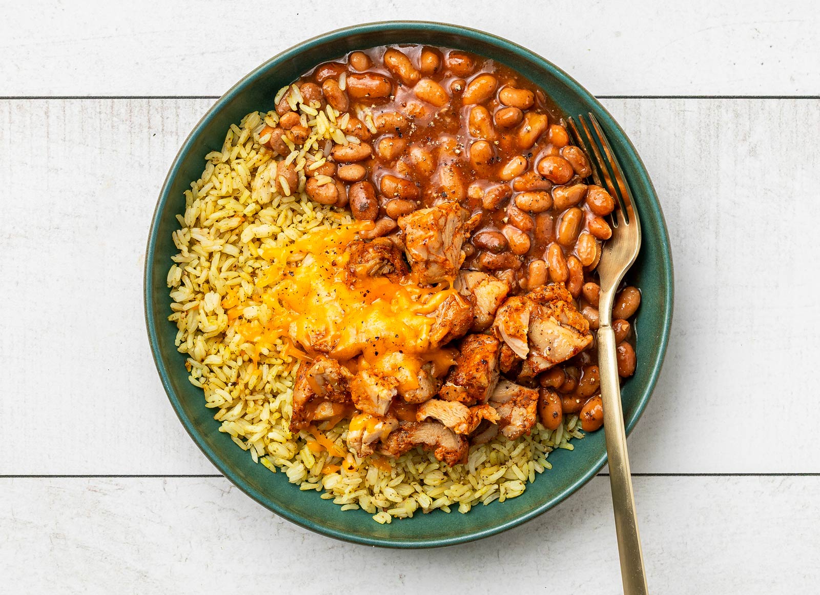 Cheesy Rotisserie Chicken Burrito Bowl with Shredded Sharp Cheddar Cheese