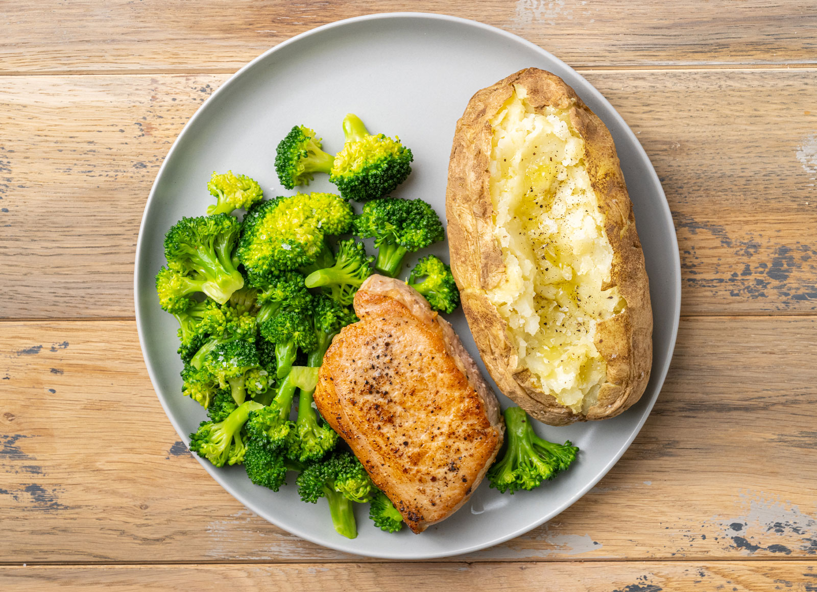 Seared Pork Chop with Baked Microwave-Ready Russet Potato +