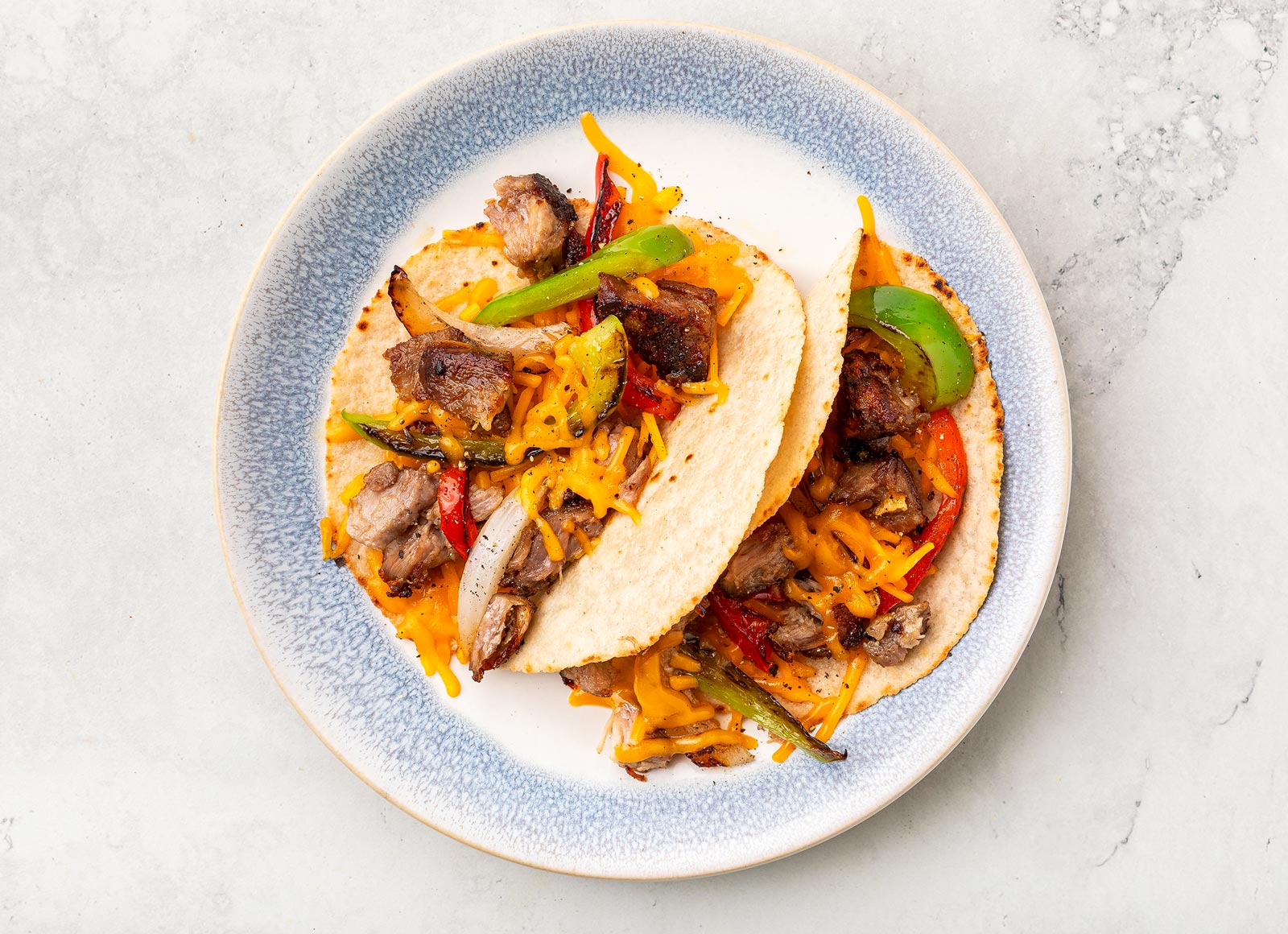 Cheesy Carnitas Keto Tacos with Shredded Sharp Cheddar Cheese