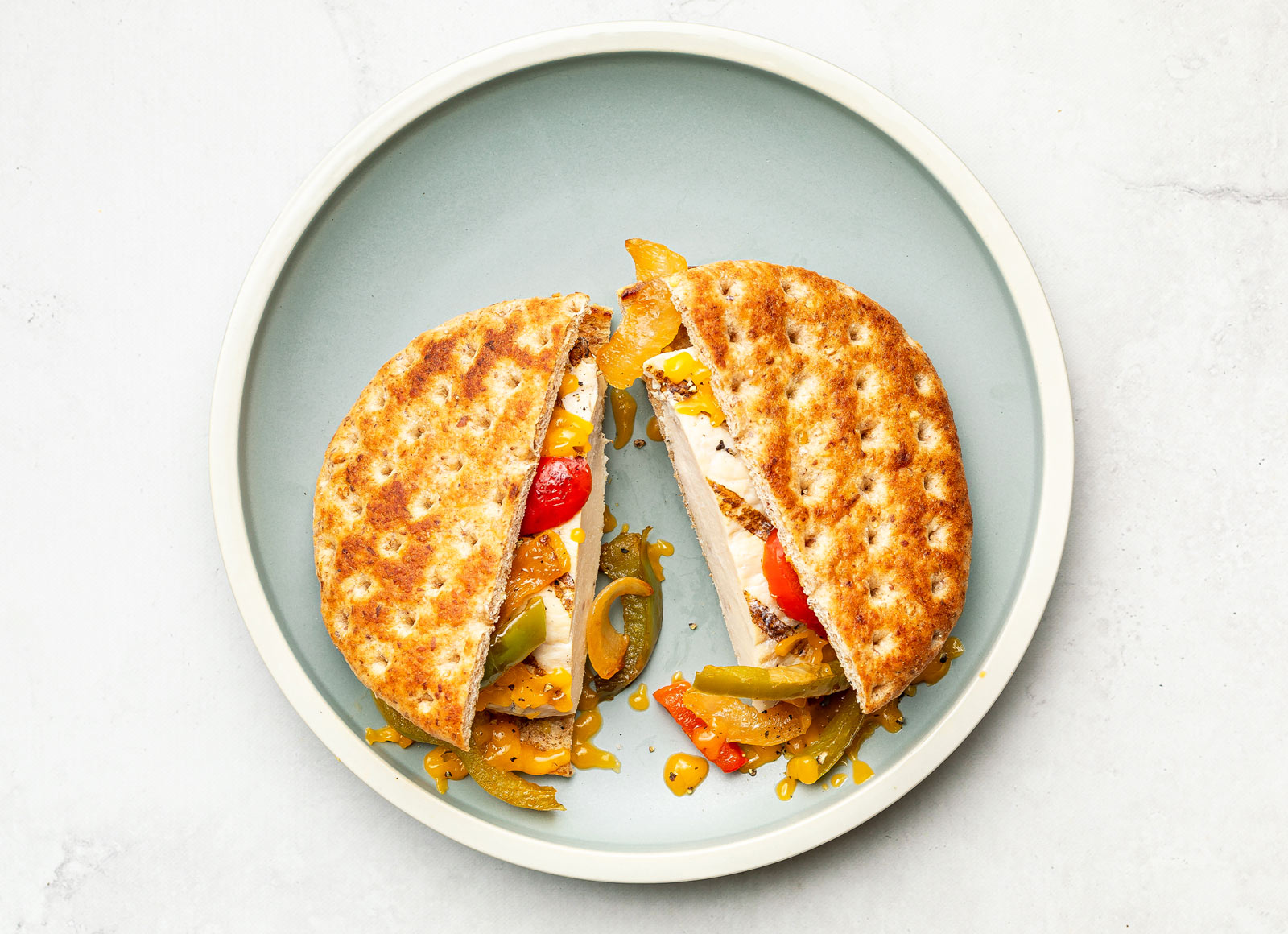 Chicken Fajita Cheddar Melt with Bell Pepper Onion Saute