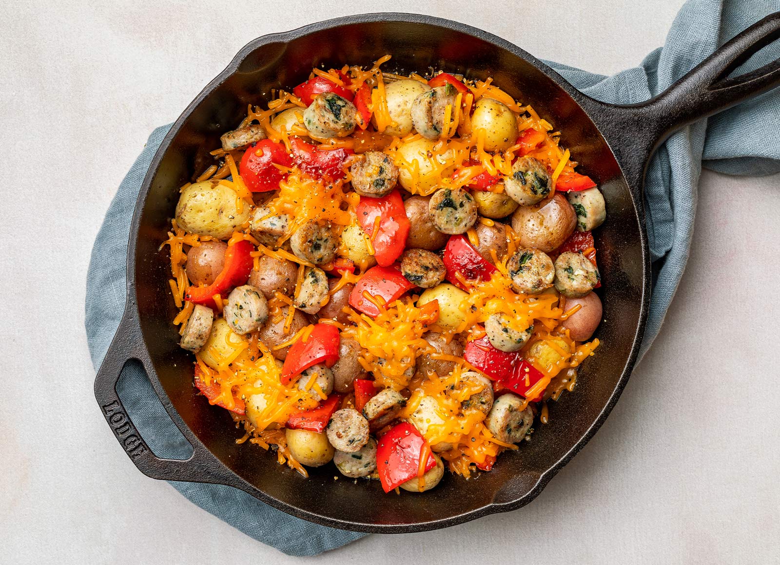 Cheesy Chicken Sausage, Peppers + Potato Skillet