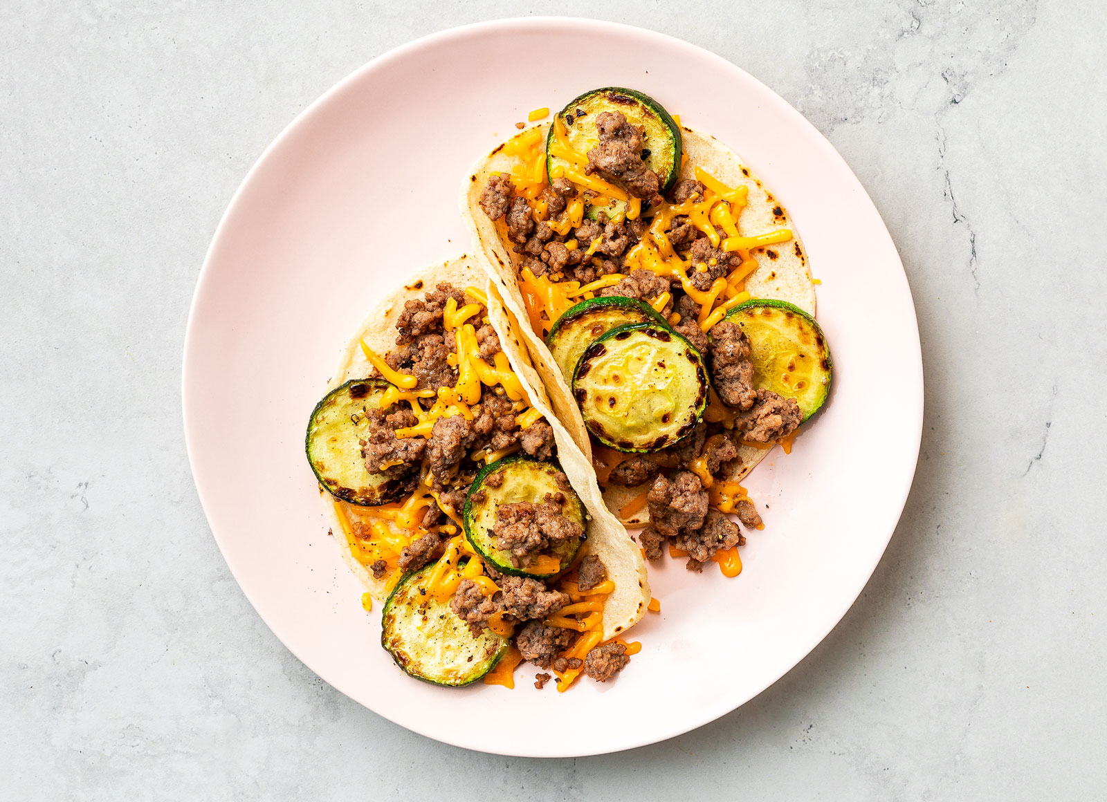  Cheesy Ground Beef Tacos + Zucchini with Shredded Sharp Cheddar Cheese