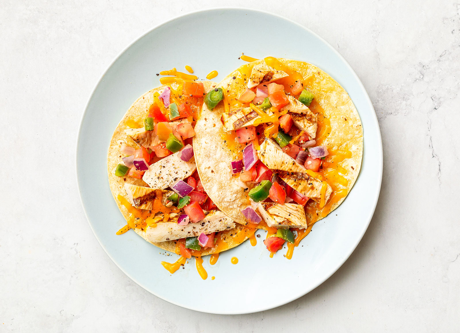 Cheesy Seasoned Grilled Chicken Breast Tostada
