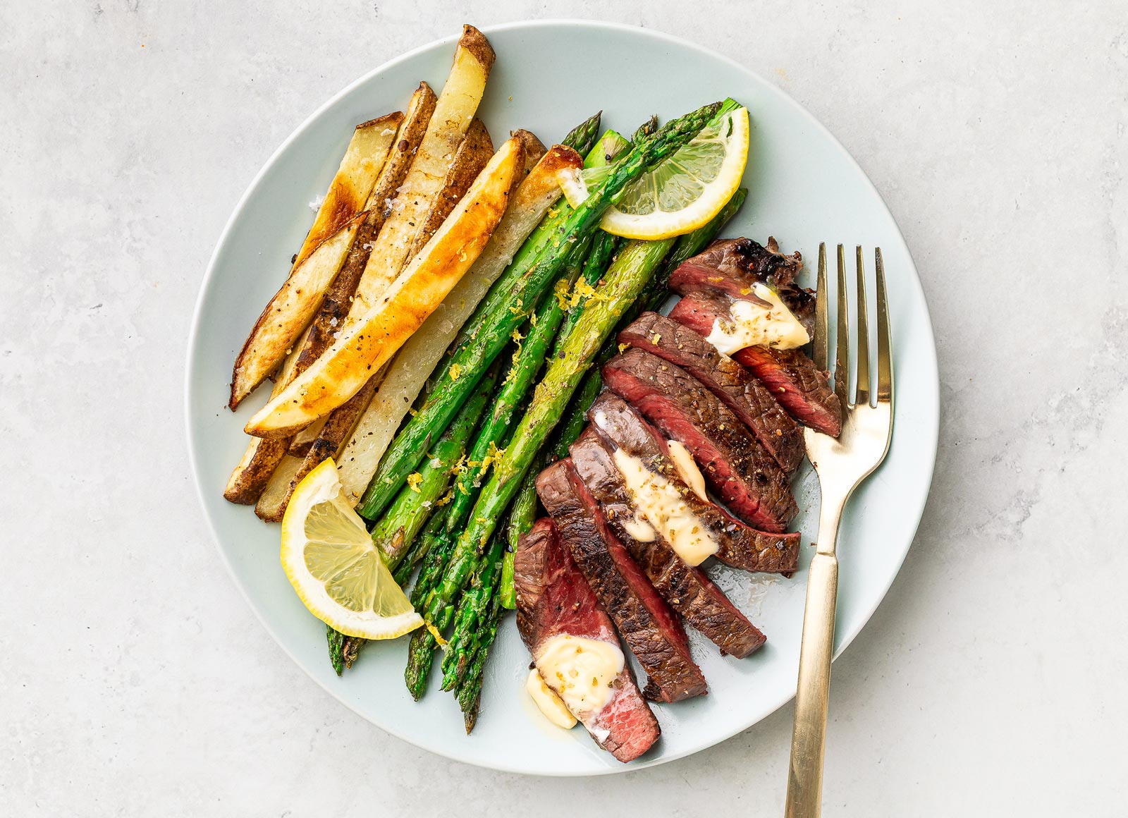 Herby Beef Sirloin Steak Frites with Lemony Asparagus