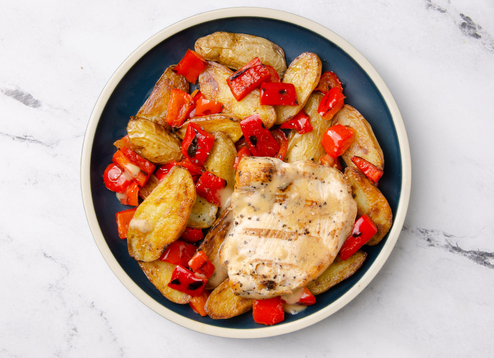 Grilled Seasoned Chicken Breast with Potato-Bell Pepper Hash