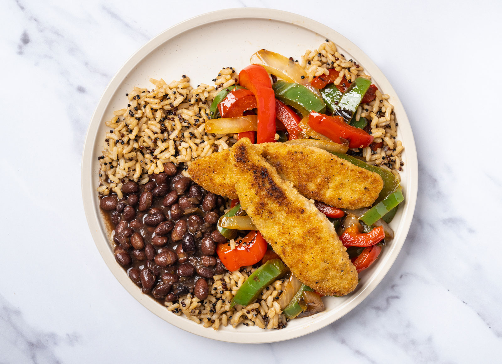 Plant-Based Chicken with Black Beans + Fajita Veggies