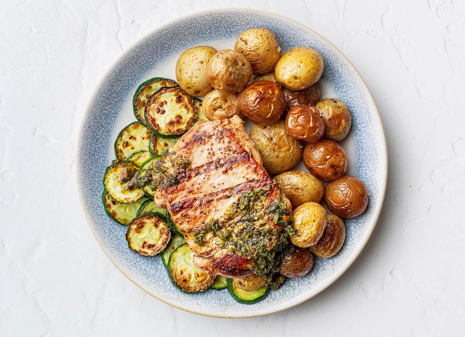 Chimichurri Pork Chops + Roasted Potatoes with Zucchini
