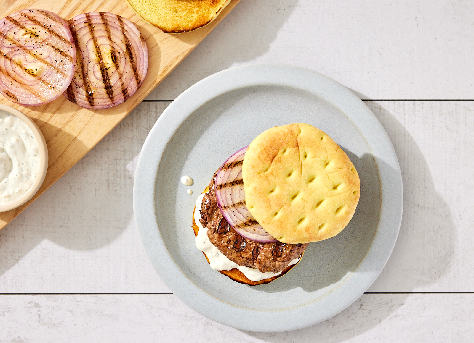 Grilled Tzatziki Lamb Burger with Grilled Onions