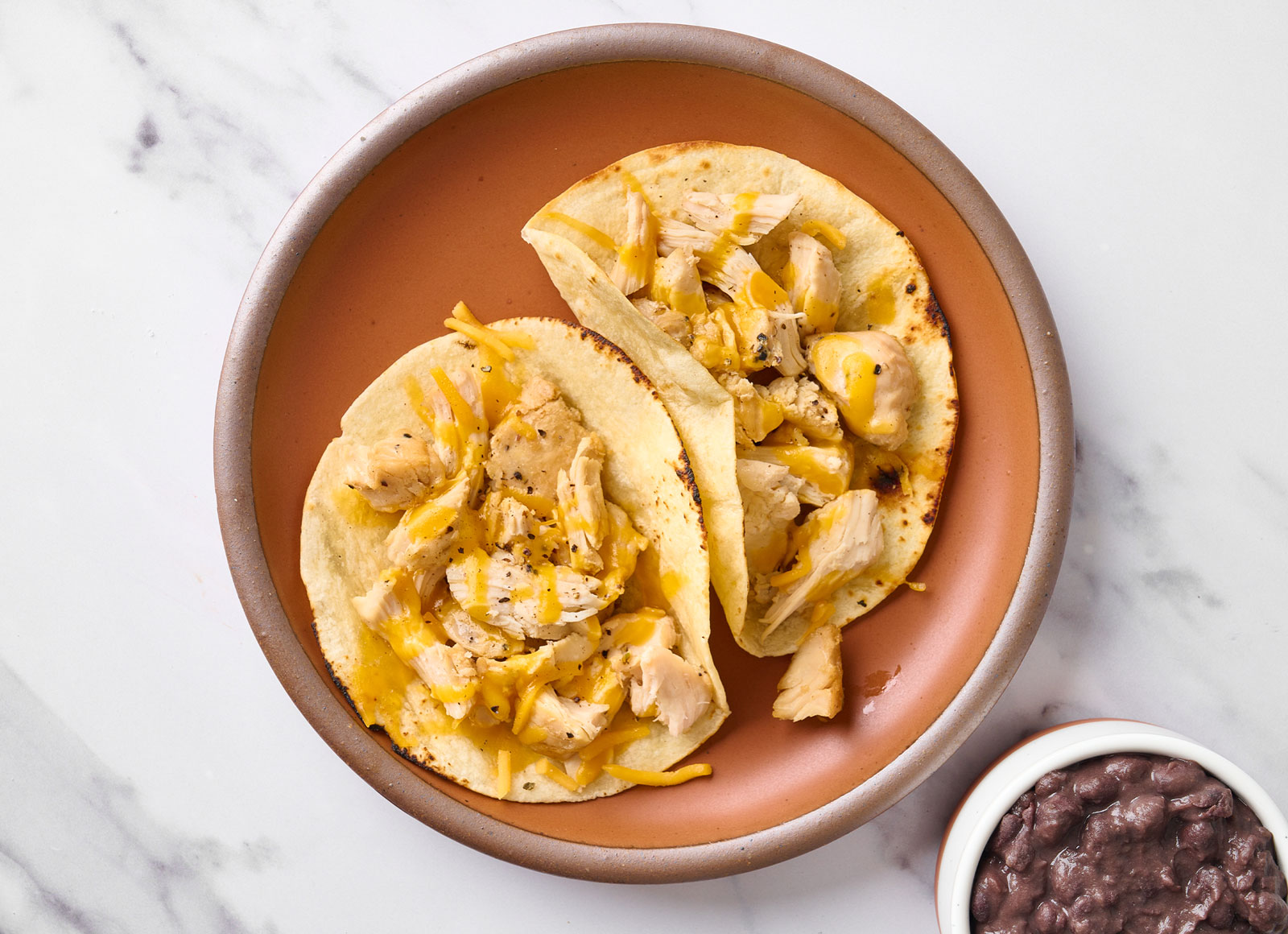 Cheesy Salt + Pepper Chicken Tacos + Cuban Spiced Black Beans
