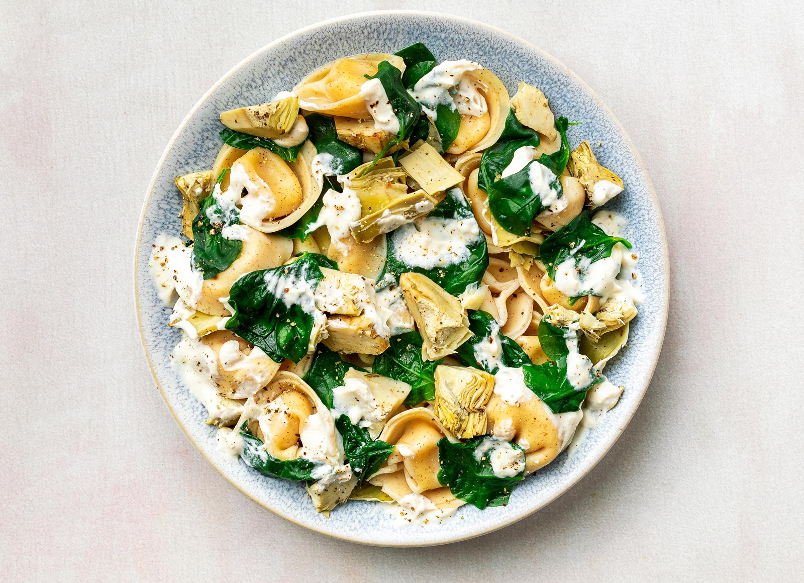 Artichoke Tortelloni Alfredo with Baby Spinach