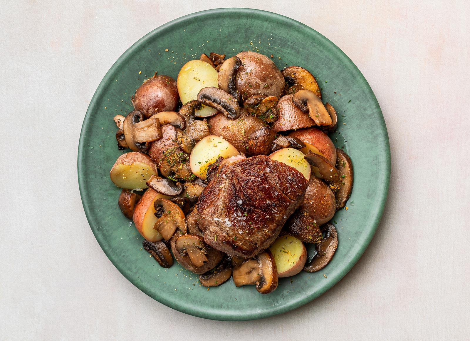 Pepper Garlic Beef NY Strip Steak n' Taters with Mushroom Pan Sauce