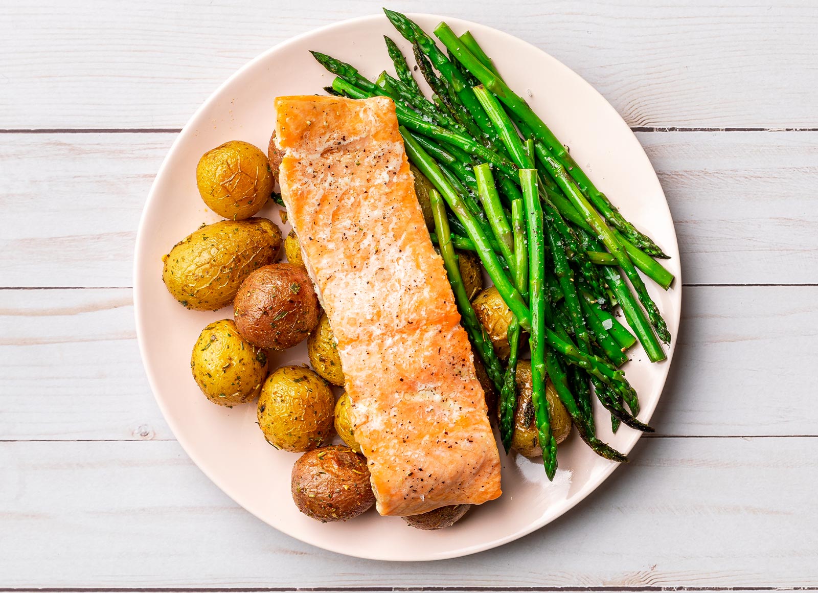 Roasted Garlic Salmon with Herbed Potatoes + Asparagus