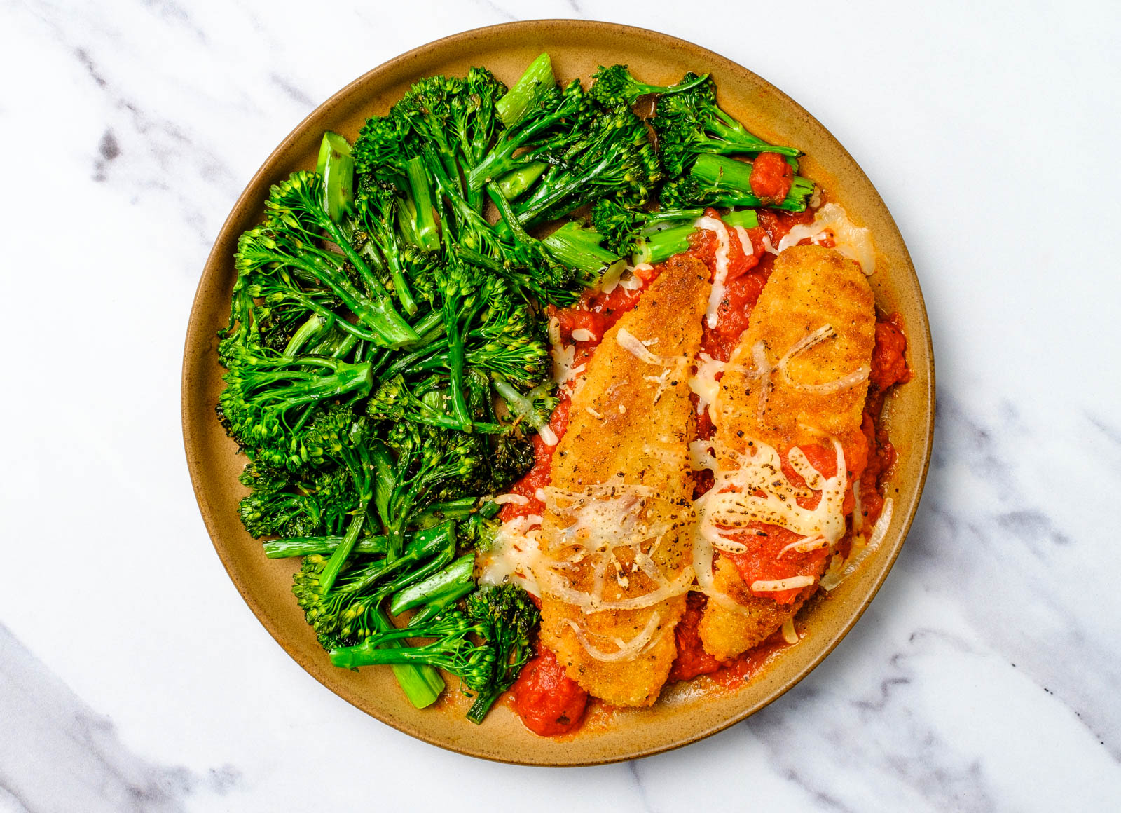 Plant-Based Chicken Parm Tenders with Baby Broccoli with Shredded Mozzarella Cheese