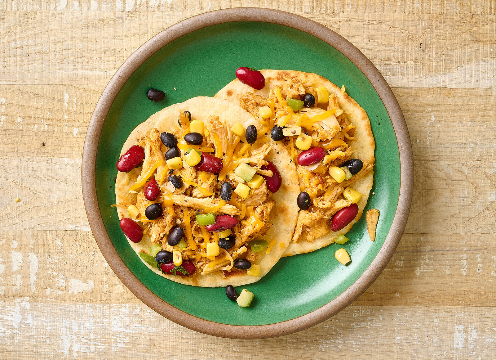 Cheesy Chicken Tostada + Corn Salsa with Shredded Sharp Cheddar Cheese