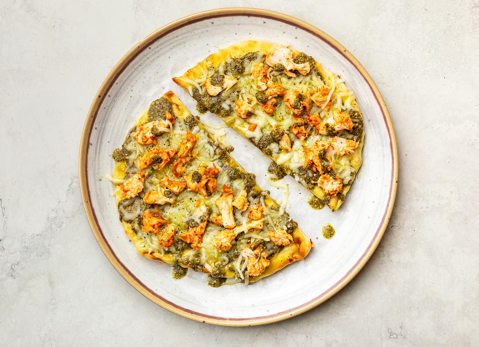 Cheesy Chicken Pesto Naan Pizza with Shredded Mozzarella Cheese