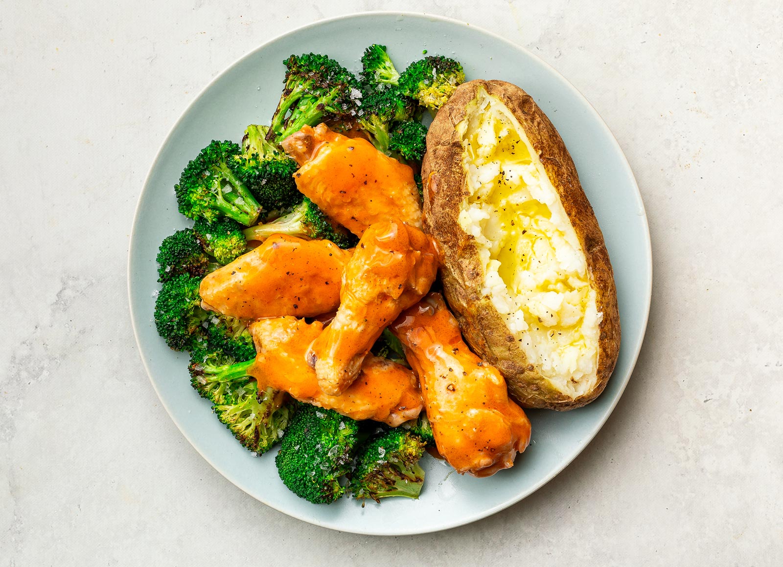 Buffalo Chicken Wings with Baked Microwave-Ready Russet Potato + Broccoli Florets