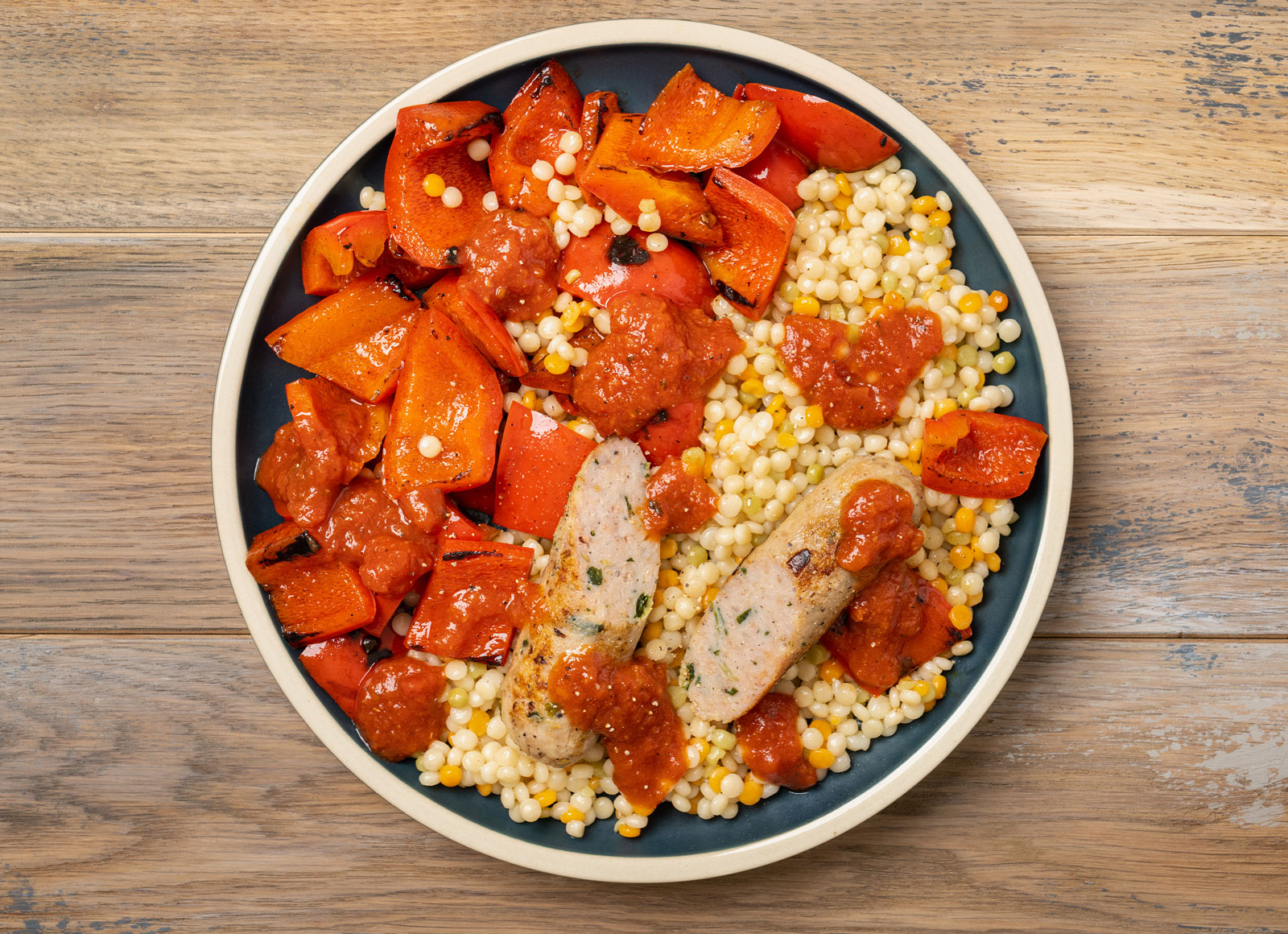 Garlicky Sausage + Peppers with Couscous