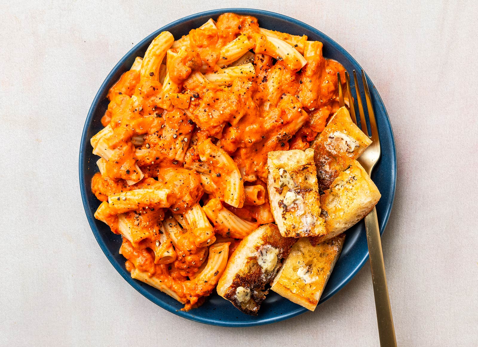 Hearty Rigatoni alla Vodka + Herby Garlic Bread