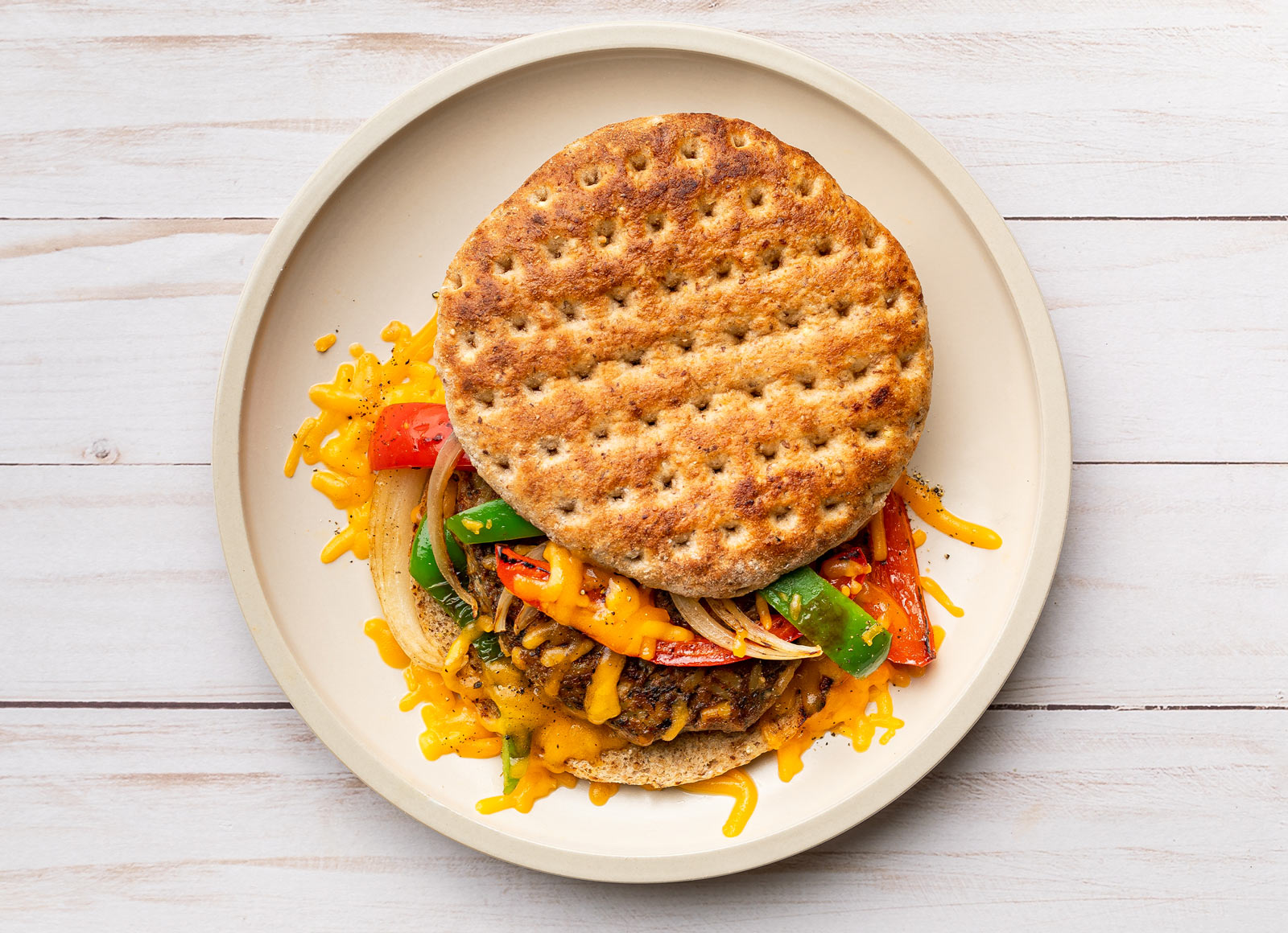 Cheesy Southwestern Chicken Burger with Bell Pepper Onion Saute