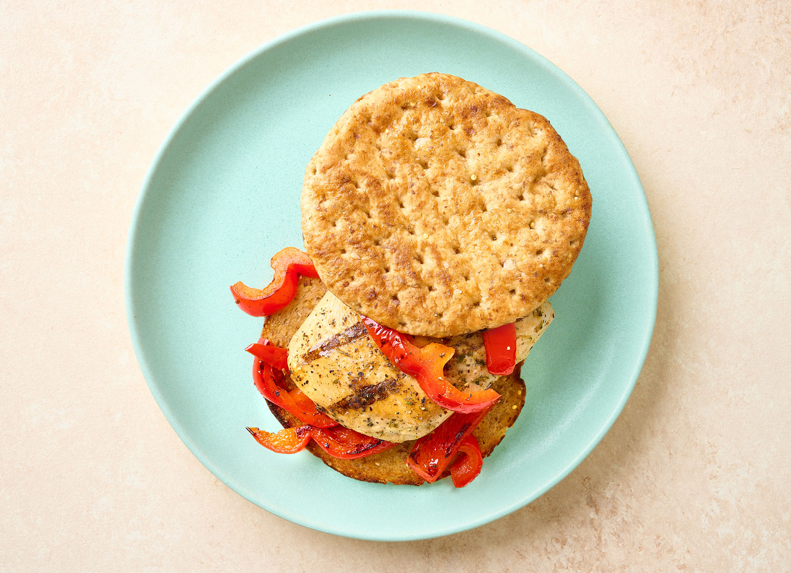 Garlic and Herb Seasoned Grilled Chicken Breast + Peppers Sandwich
