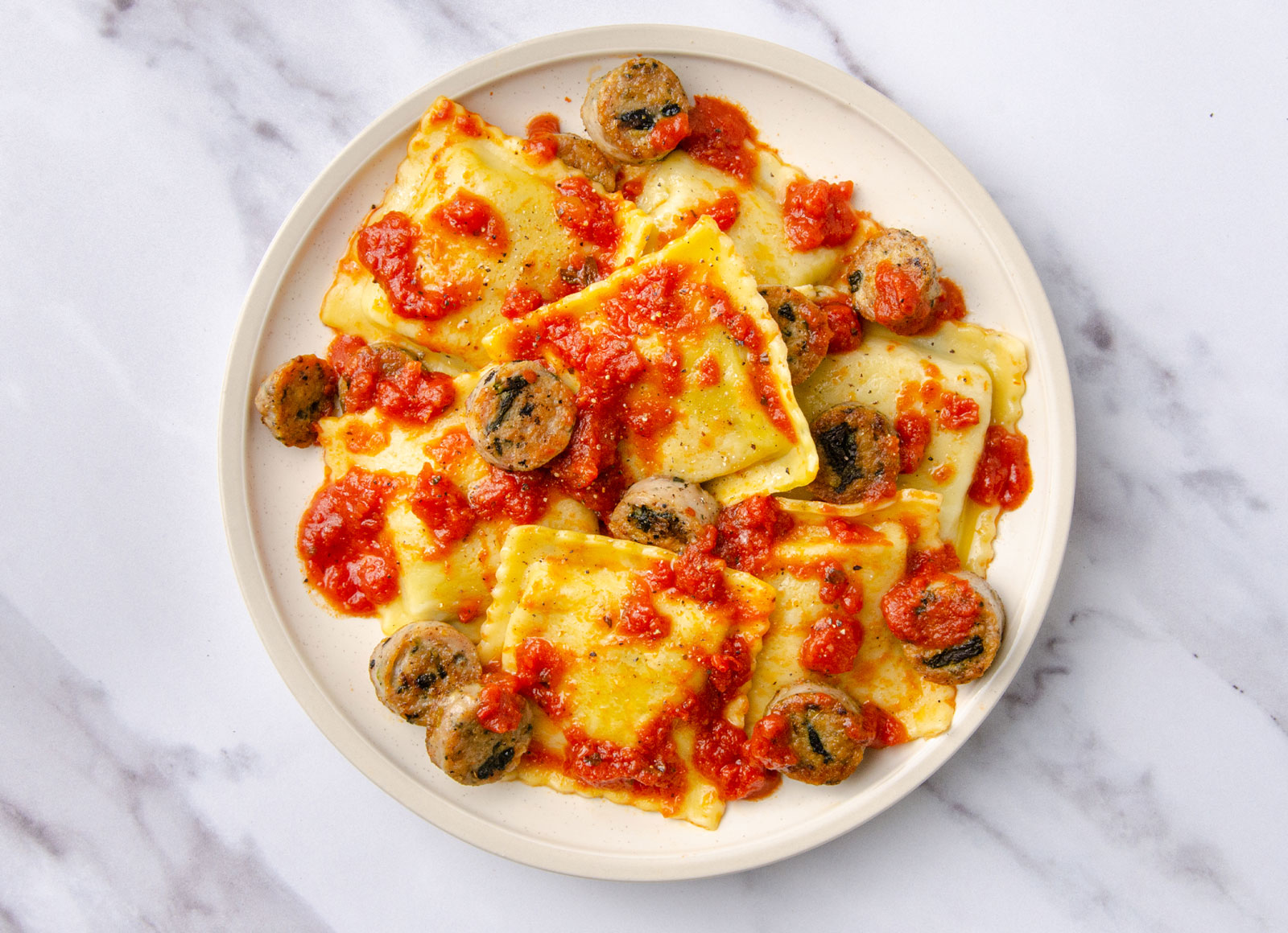 Ricotta Ravioli + Sausage in Marinara