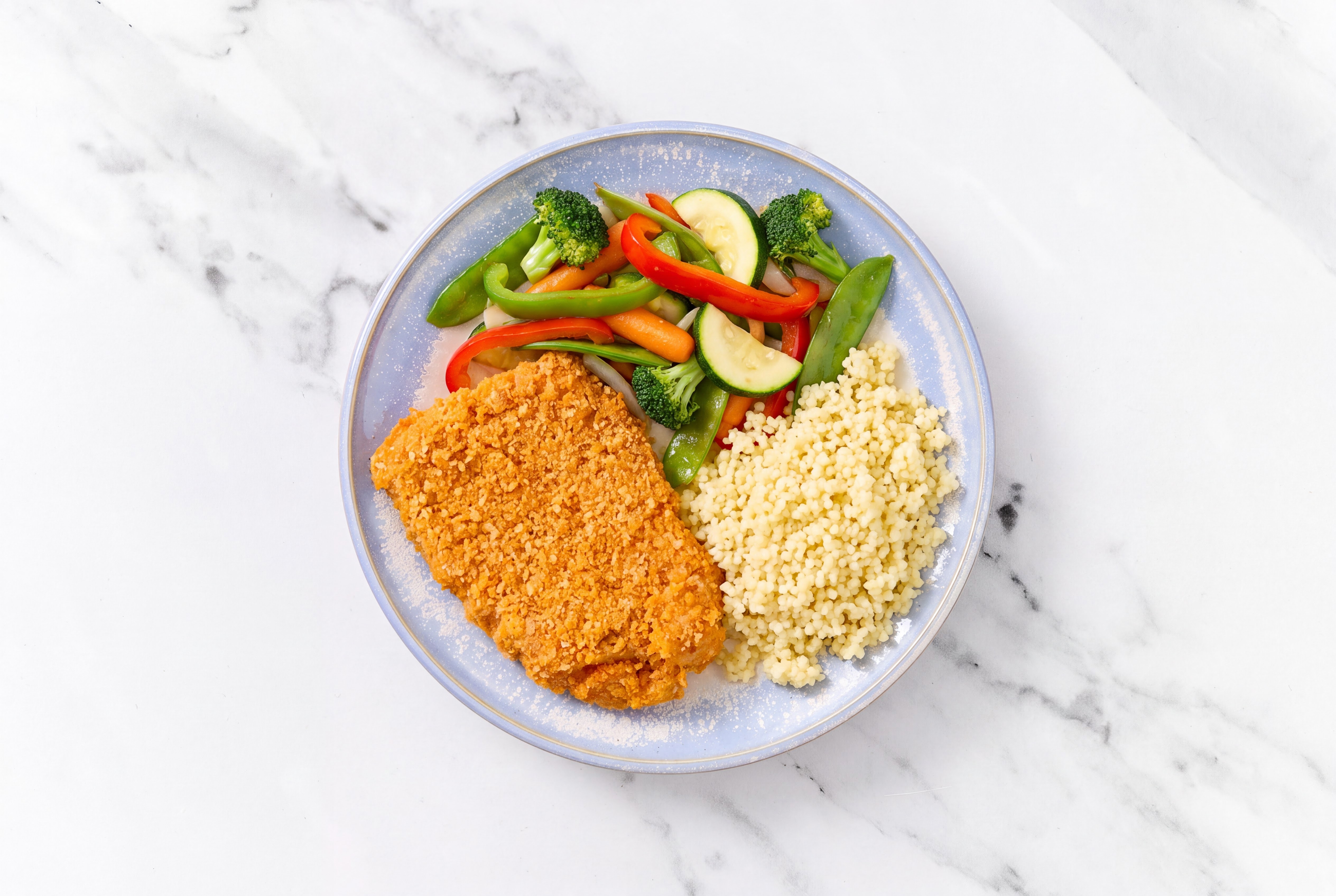 Hot Honey Breaded Chicken Cutlet with Mixed Veggies & Couscous