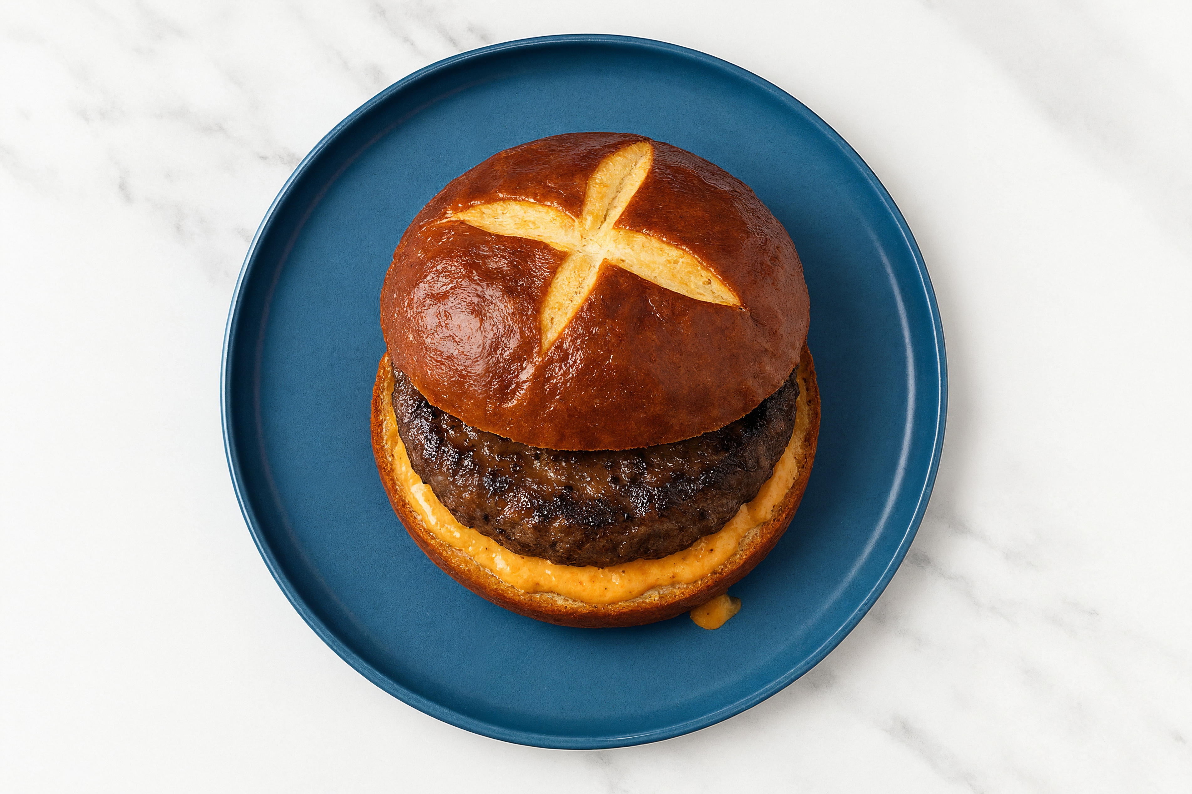 Classic Hamburger on a Pretzel Bun with Creamy Smoky BBQ with Wagyu Beef Patties