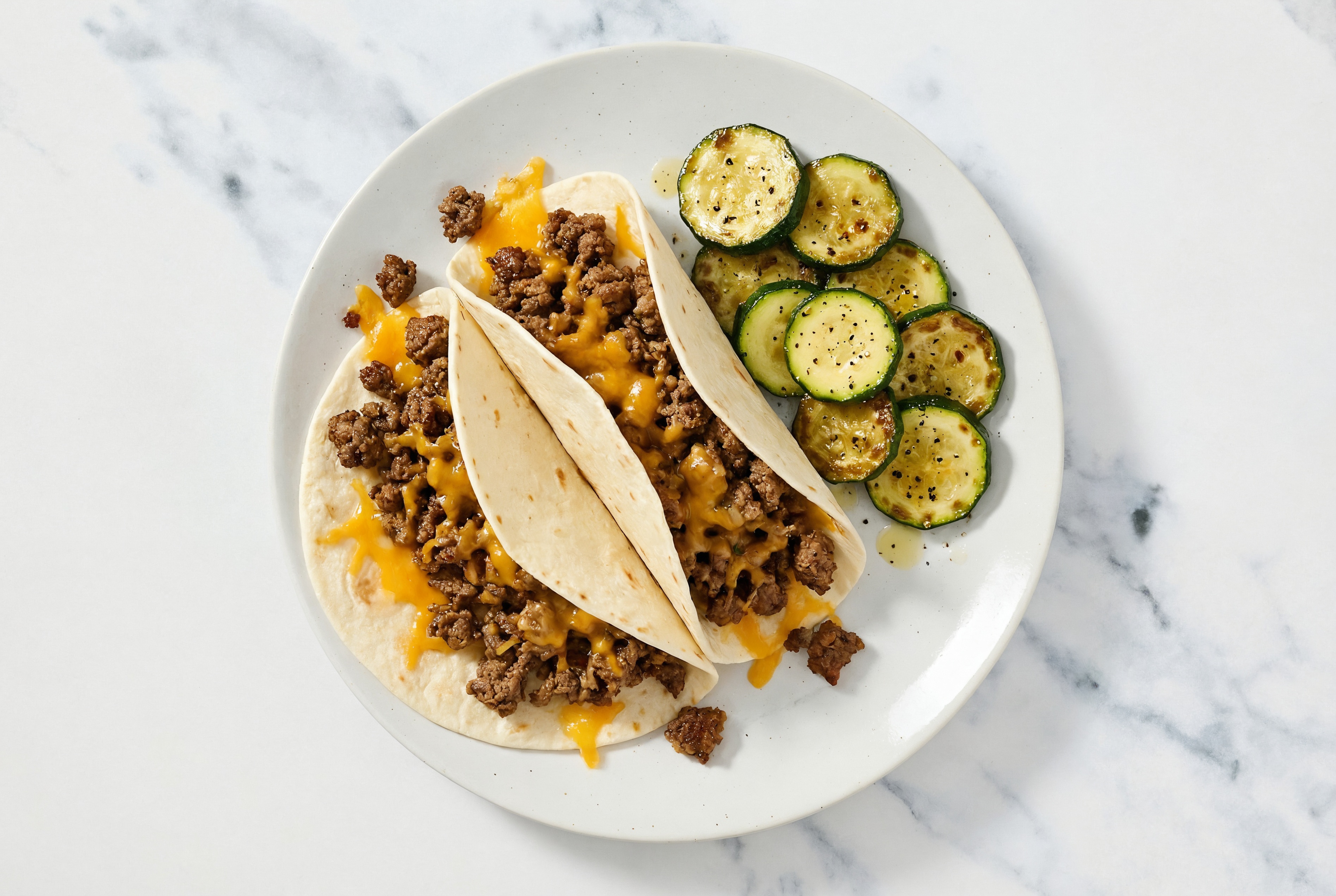 Cheesy Ground Beef Tacos + Zucchini with Sharp Cheddar Bar