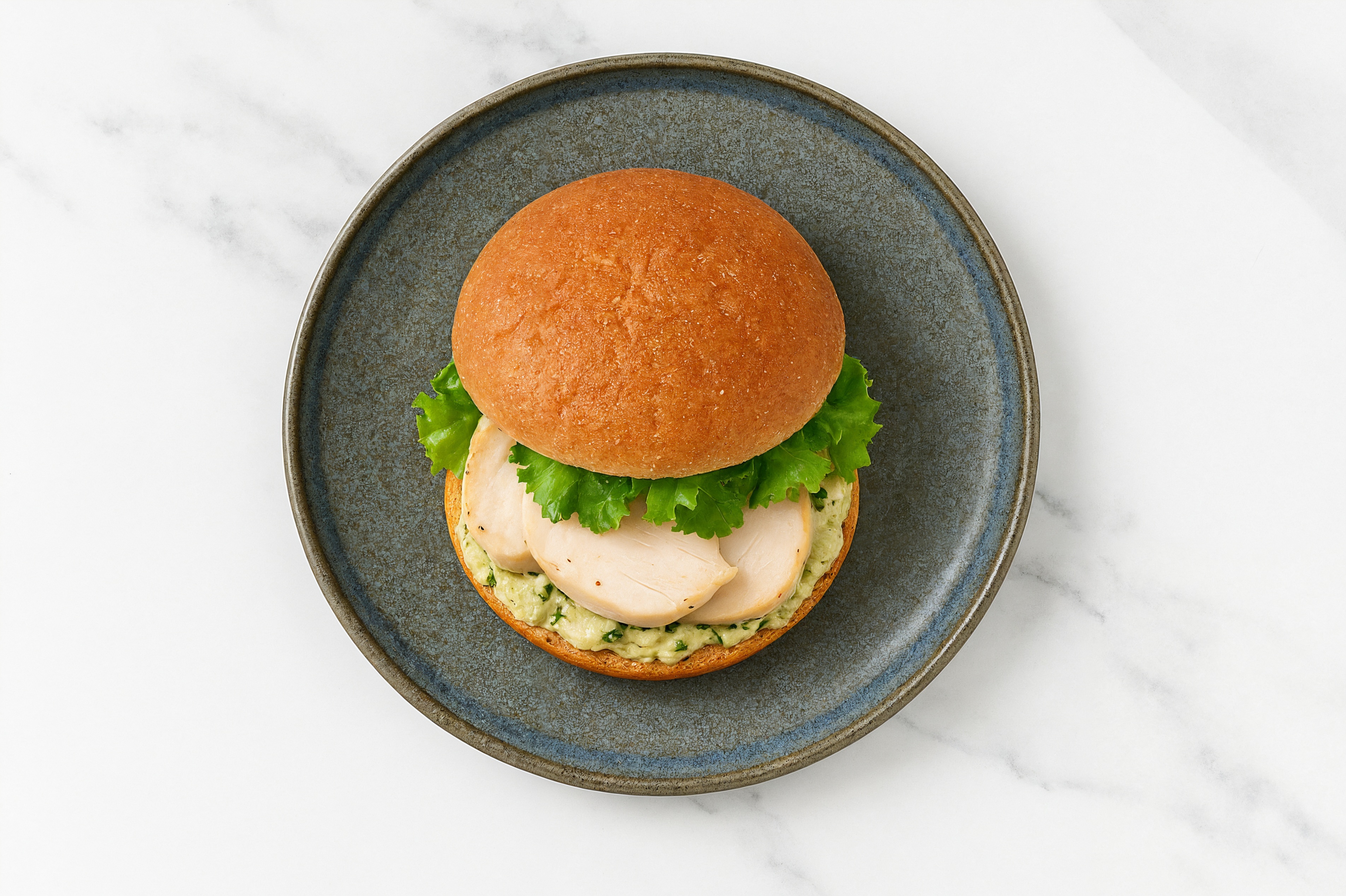 Creamy Artichoke Roasted Chicken Sandwich with Green Leaf Lettuce on Gluten-Free Buns