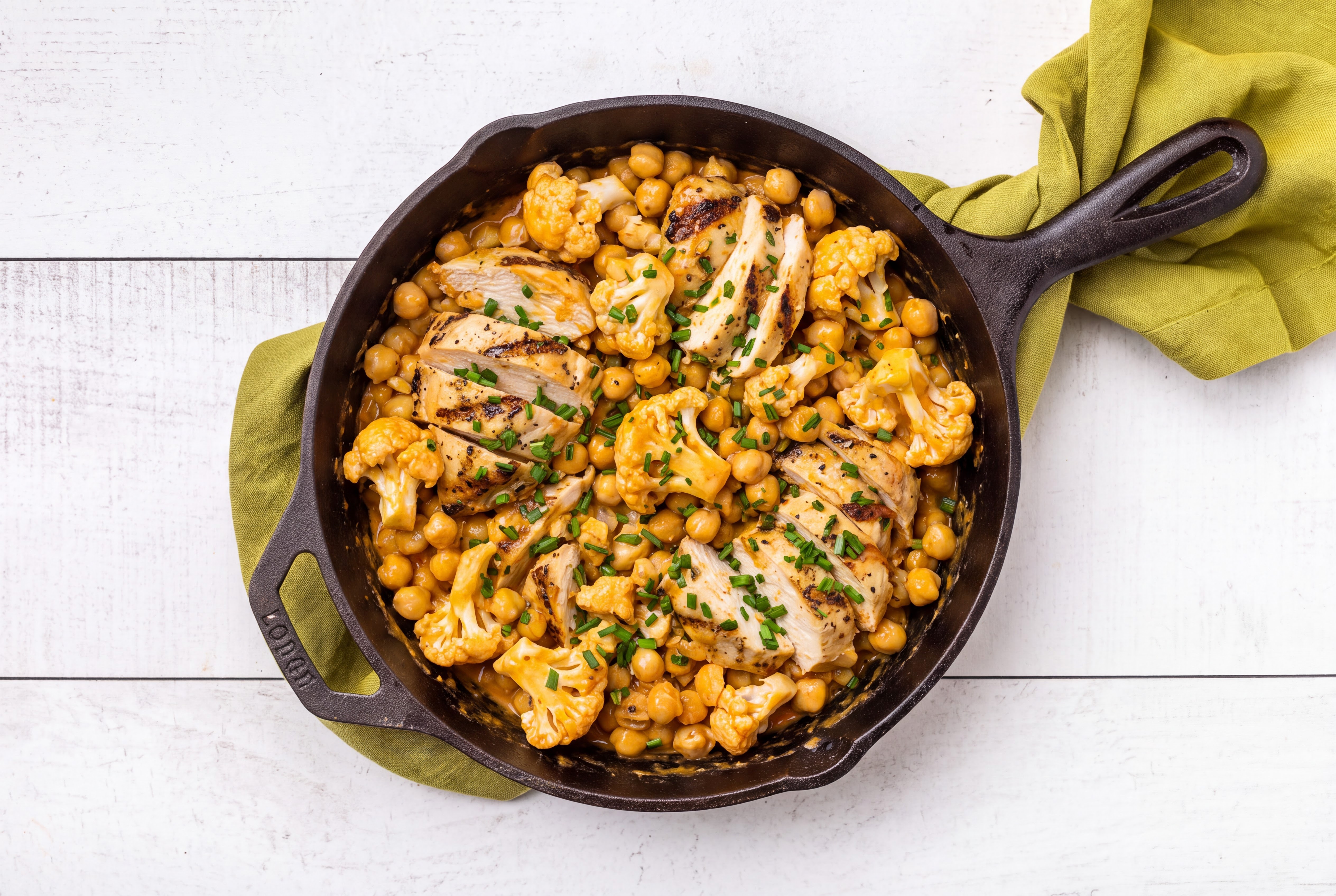 Chickpeas + Chicken in Peppery Sauce with Cauliflower + Chives with Dill Pickle Buffalo Everything Sauce