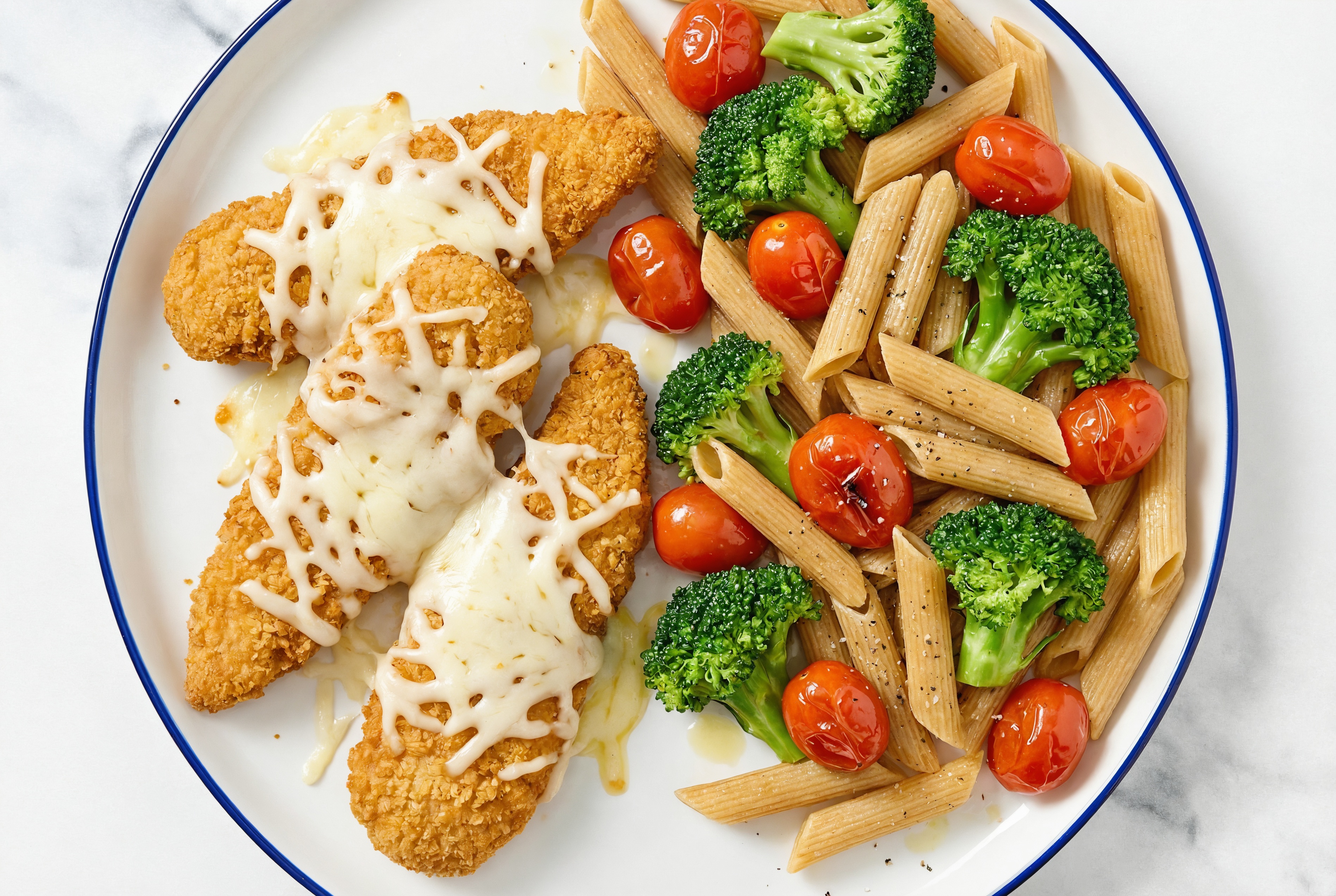 Sourdough Penne Rigate + Chick'n Tenders with Broccoli, Mozzarella + Tomatoes