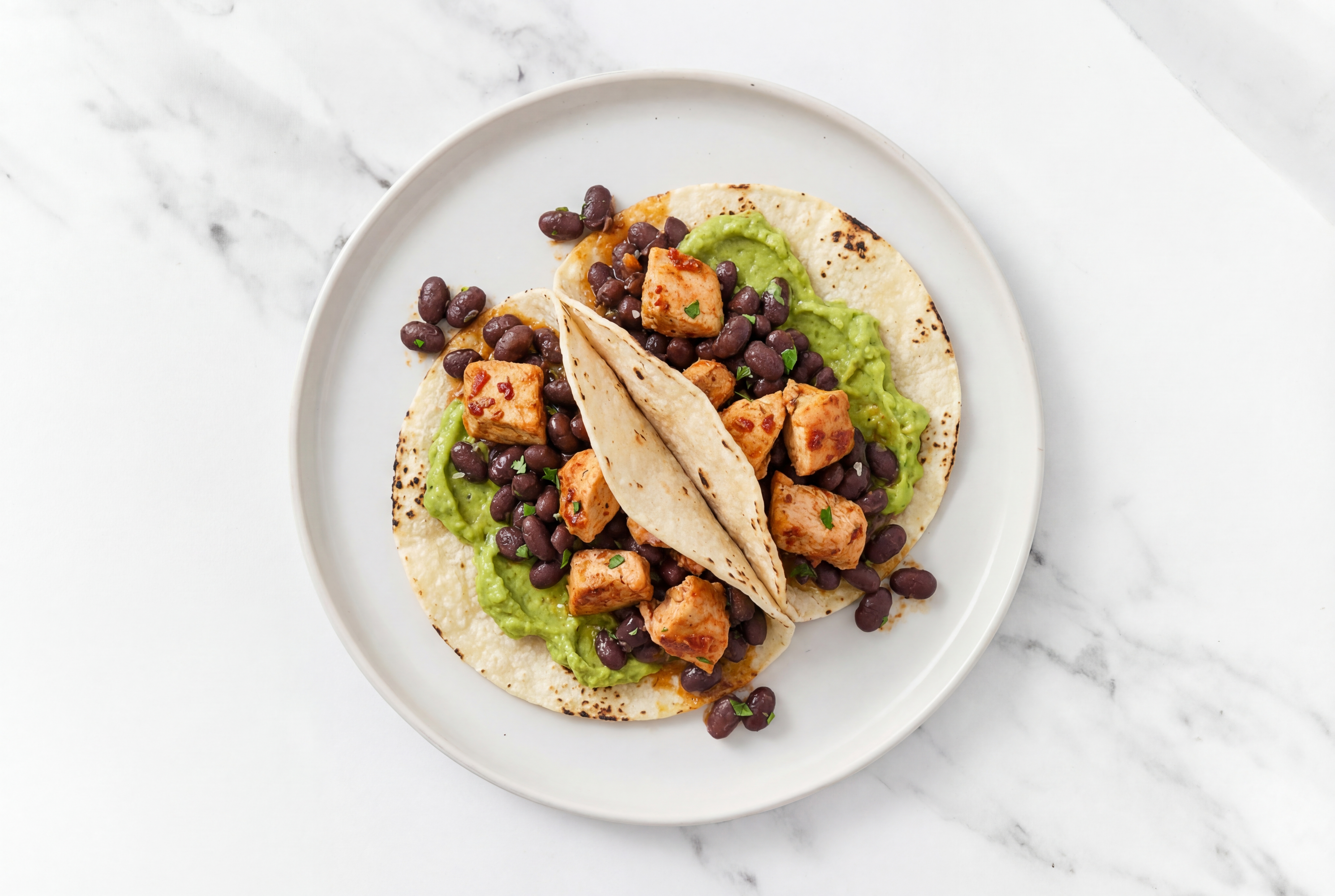 Hearty Chipotle Chicken Tacos with Avocado & Spiced Beans