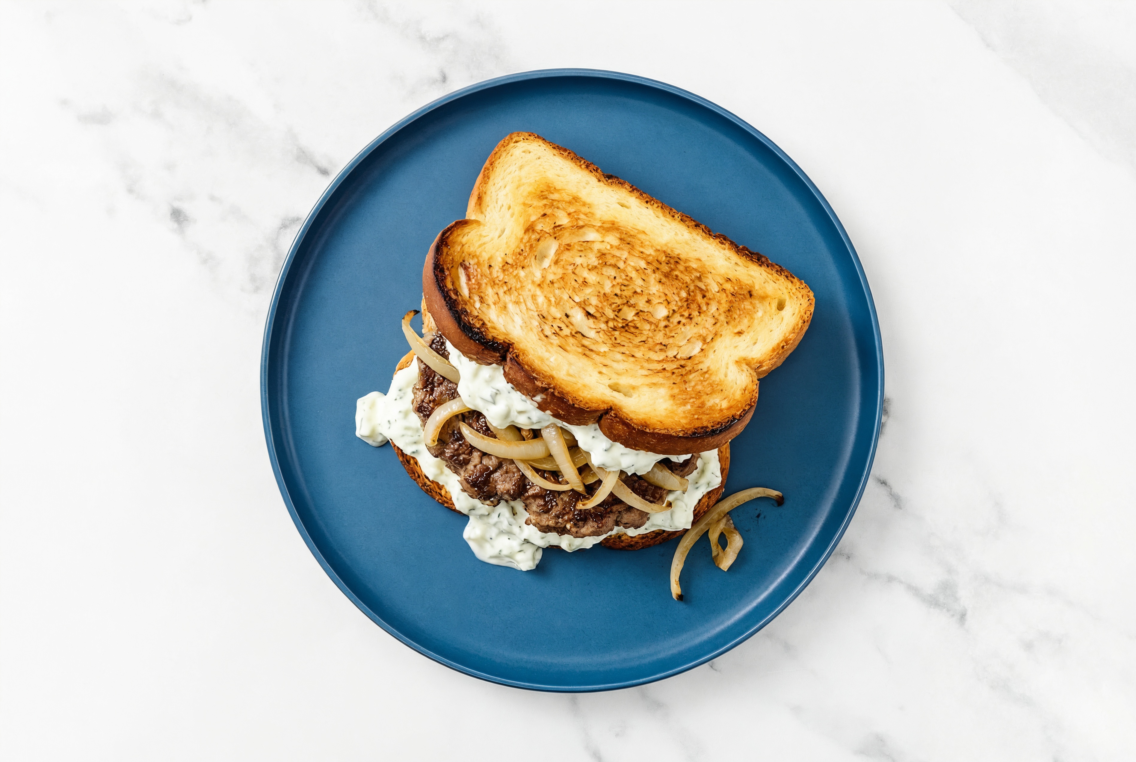 Caramelized Onion Wagyu Beef Burger on GF Bread with Cucumber Tzatziki