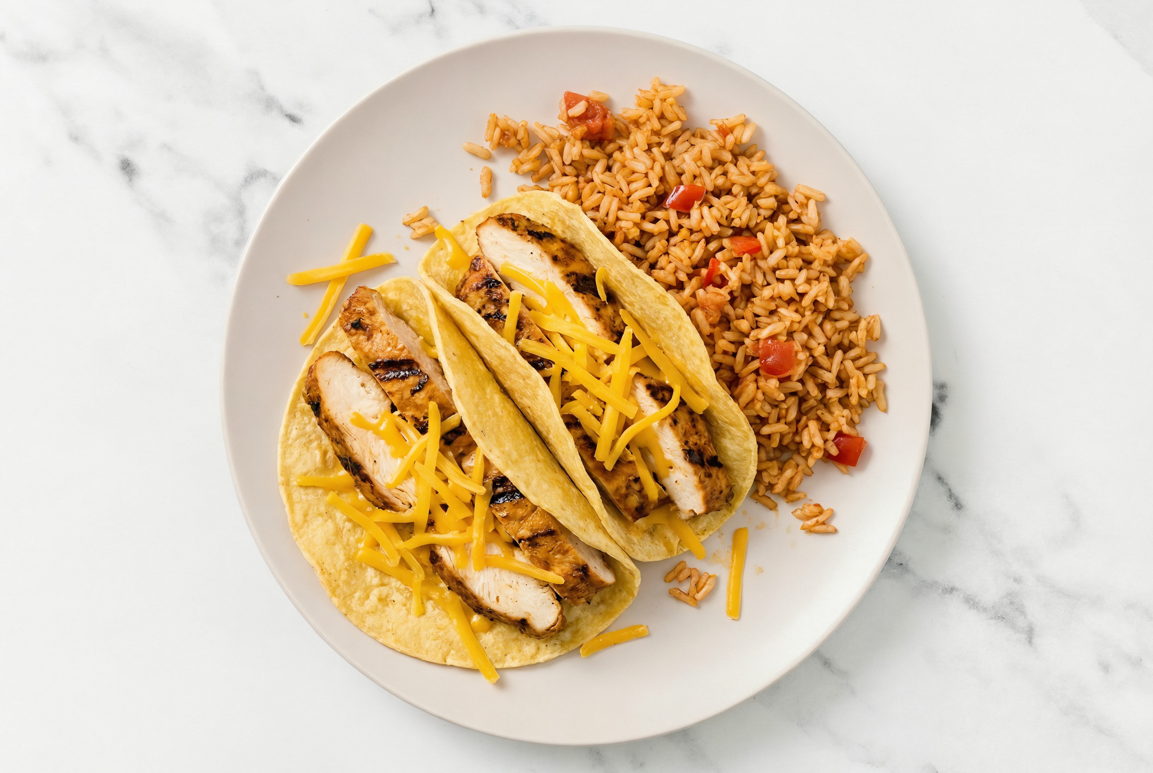Cheesy Blackened Chicken Tacos + Mexican Rice with Sharp Cheddar Bar