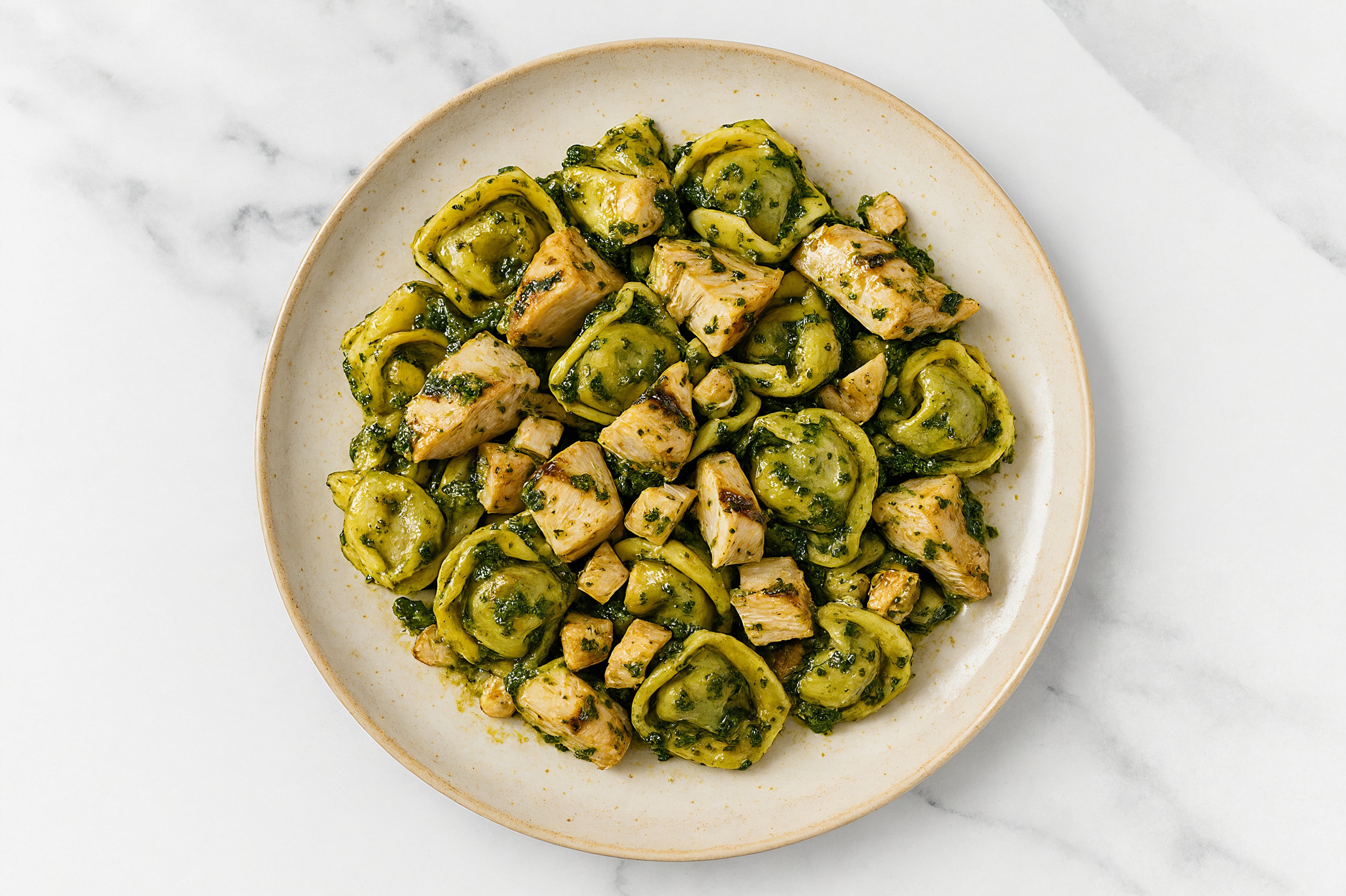 Pesto Tortellini with Seasoned Grilled Chicken Breast