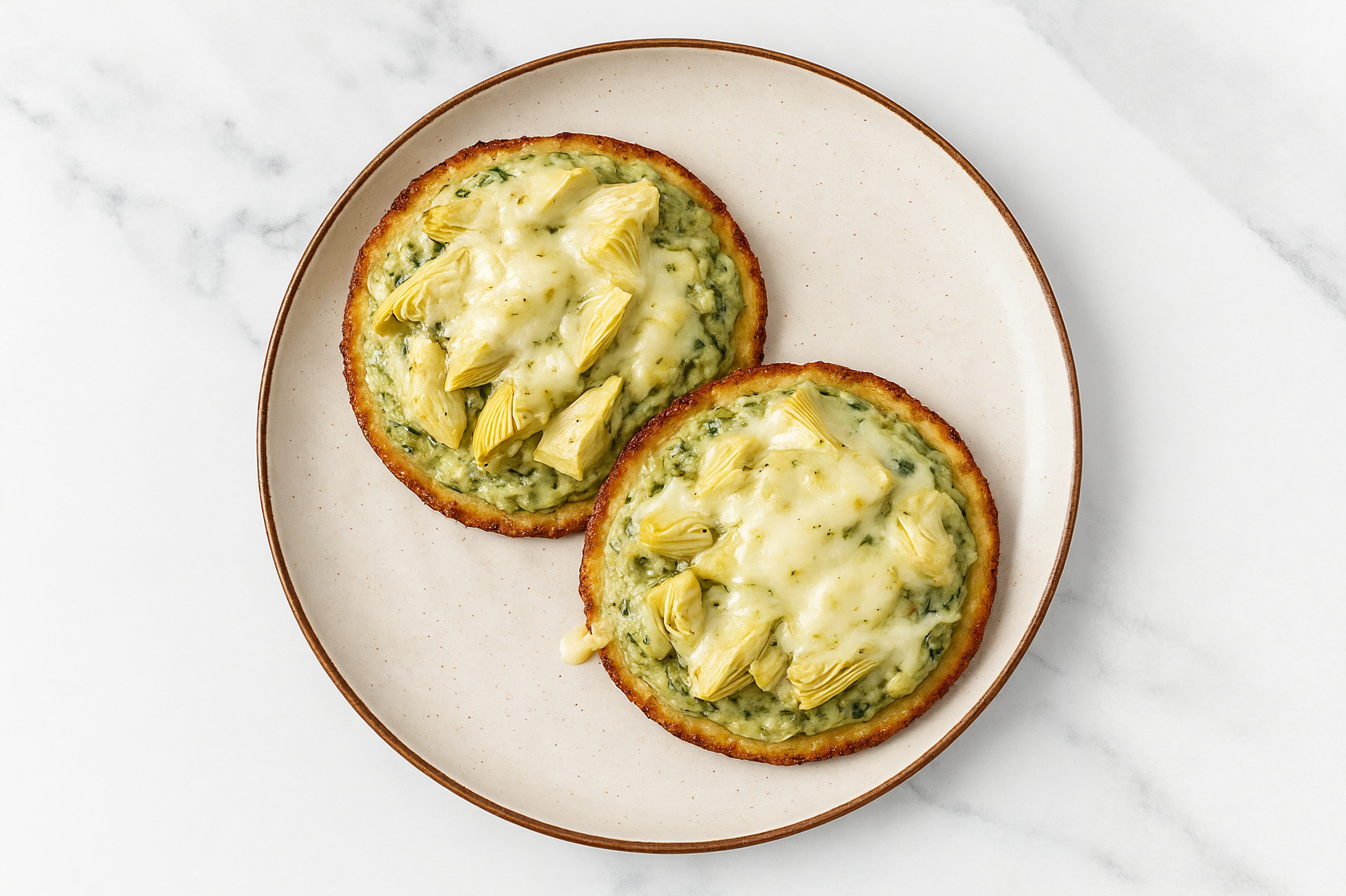 Spinach Artichoke Pizzettes with Shredded Mozzarella Cheese