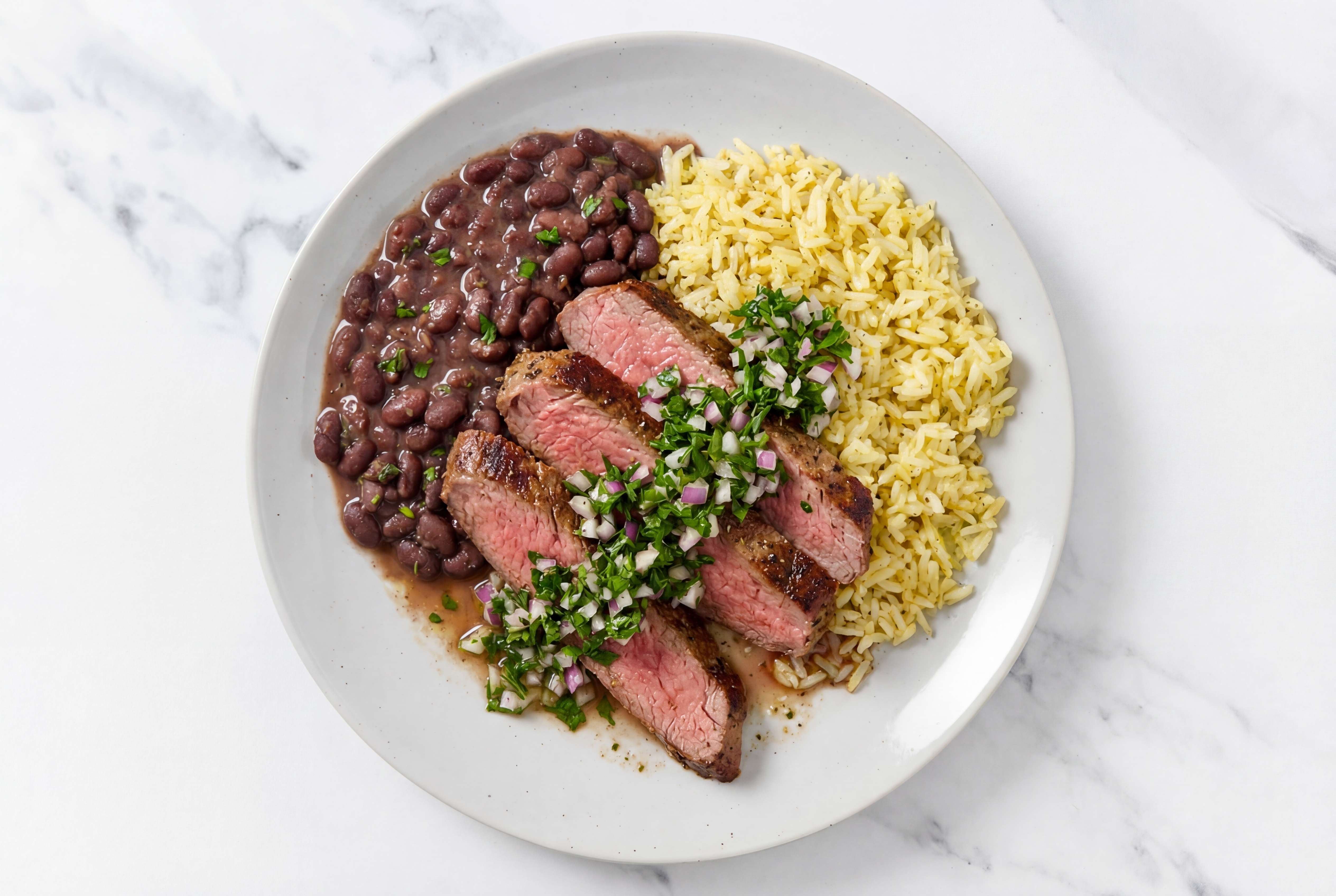 Rosemary Garlic Beef Flank Steak with Salsa Verde + Cuban Spiced Black Beans