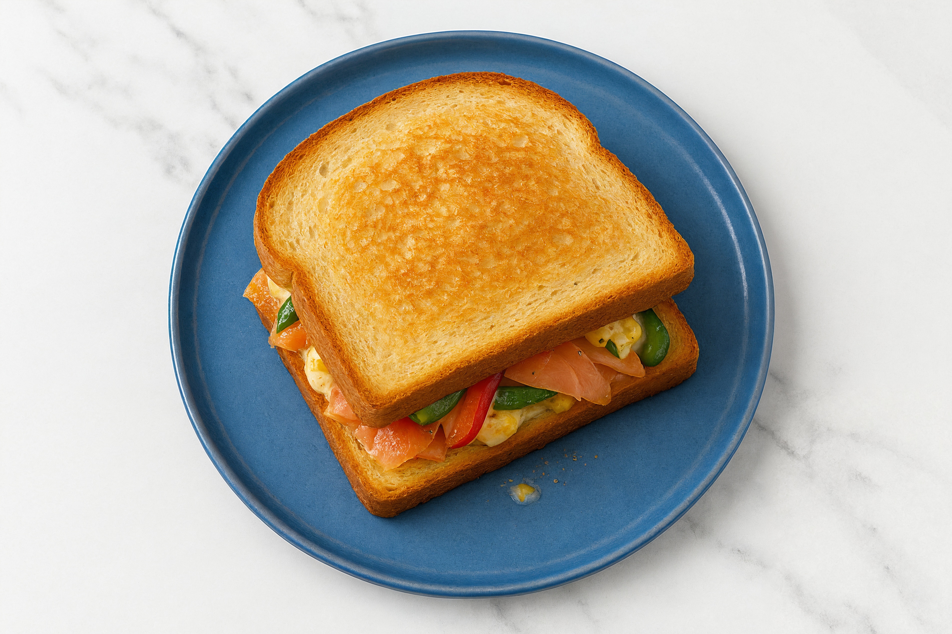 Street Corn Smoked Salmon Sandwich with Peppers + Onion on Honey White Bread