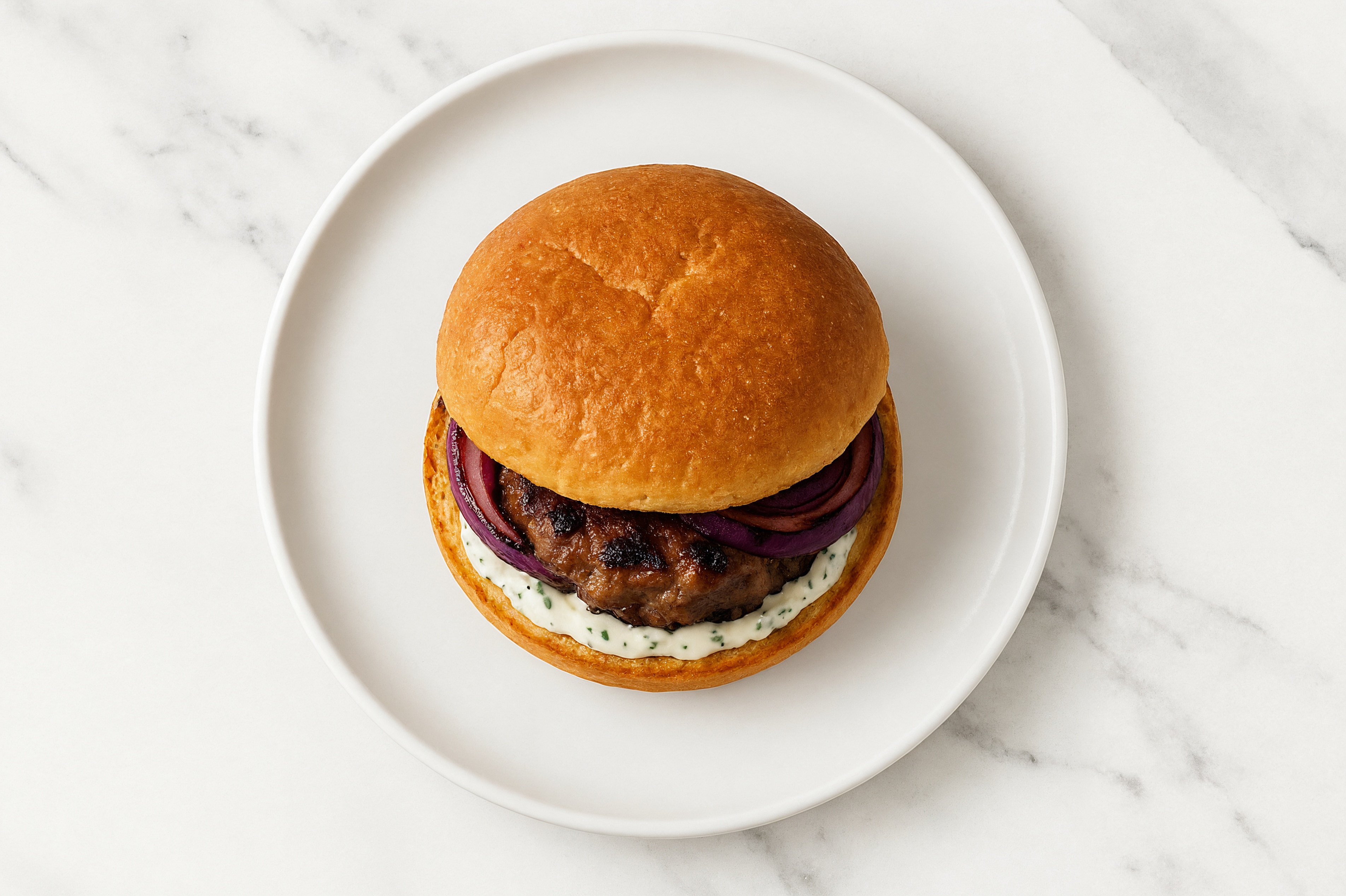 Hearty Grilled Tzatziki Lamb Burger with Grilled Onions