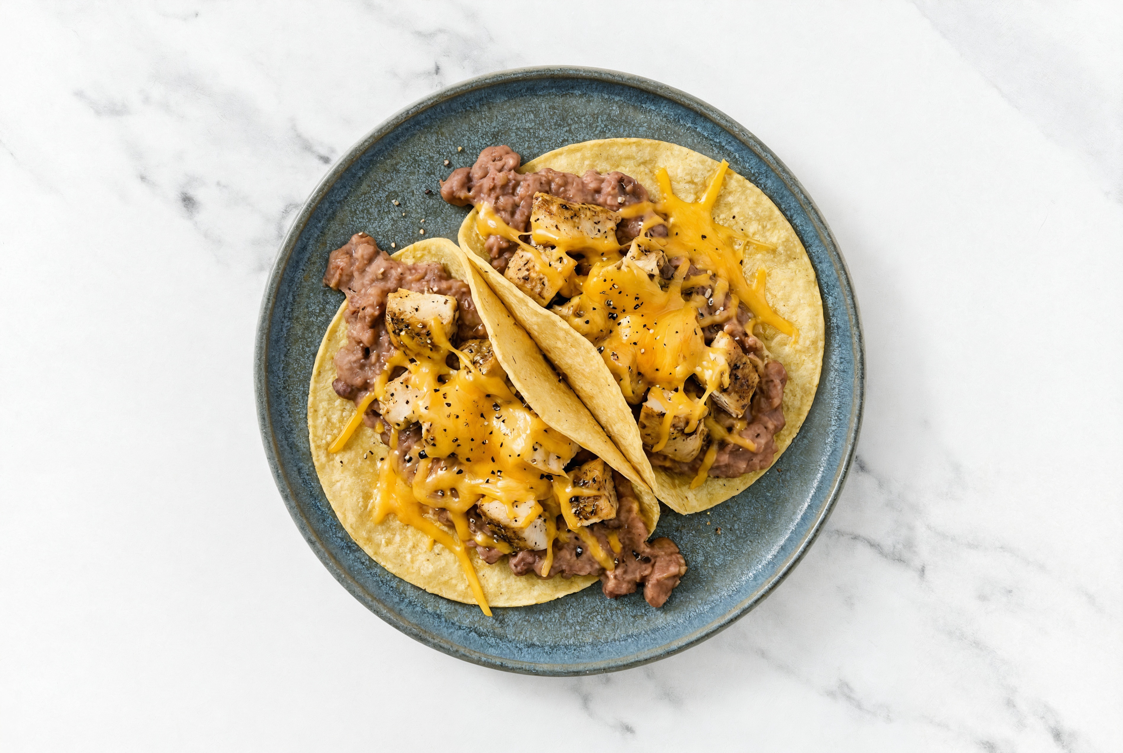 Herby Garlic Chicken Tacos with Cheddar Cheese & Refried Red Beans